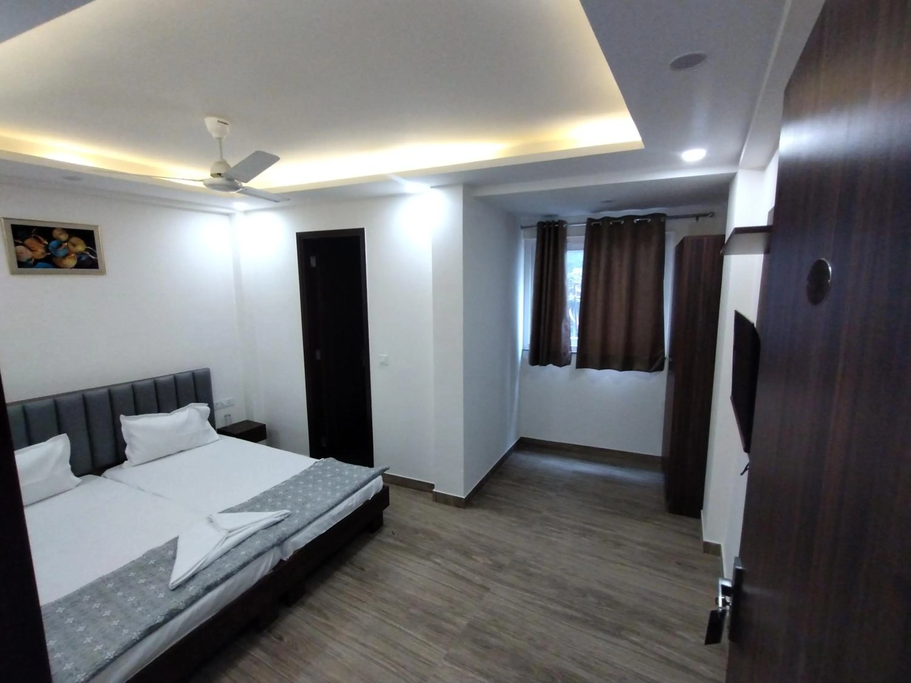 Bed in Hotel Sunrise Ecostay