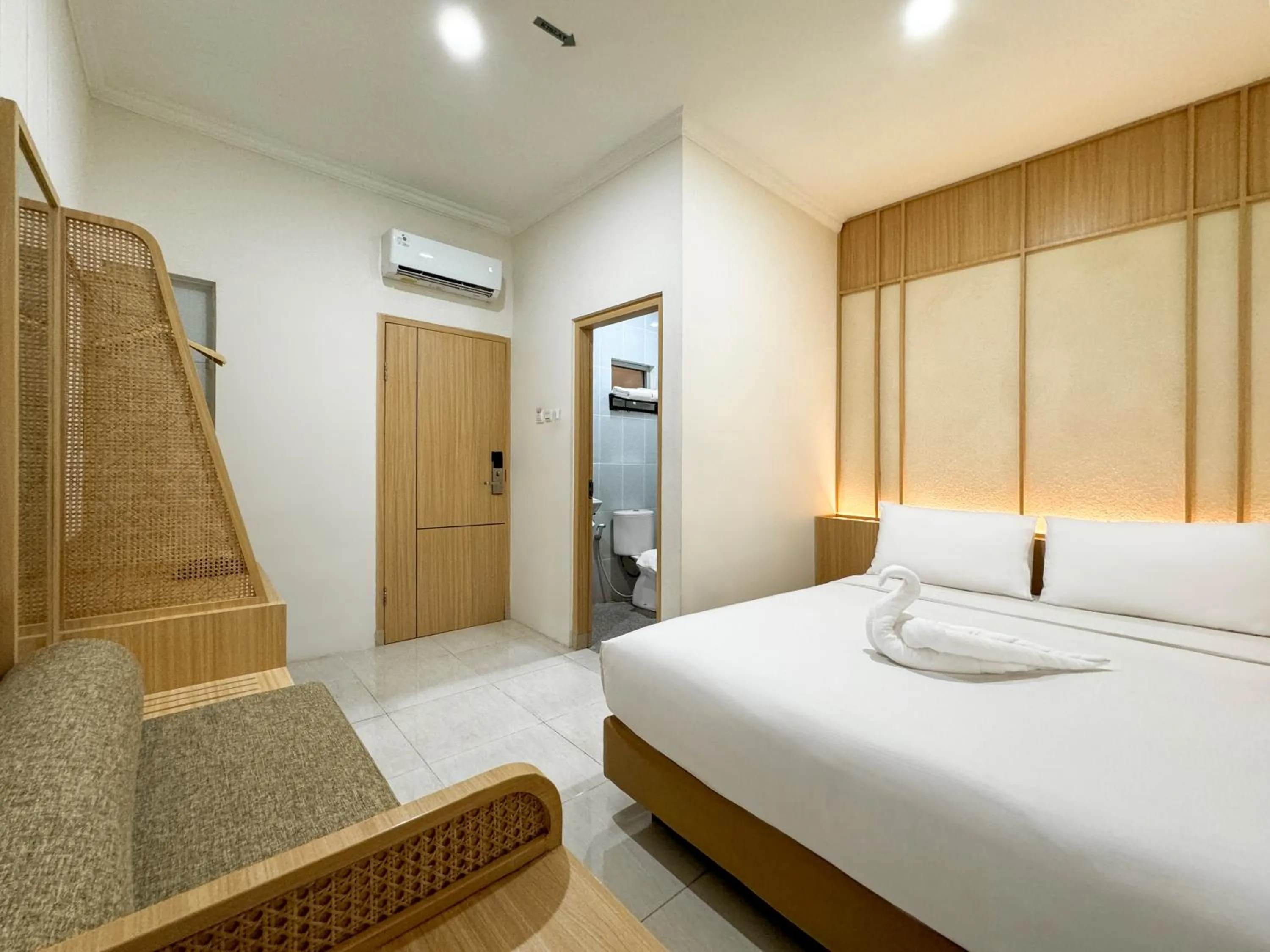 Bed in Masri Living by Daphna Management