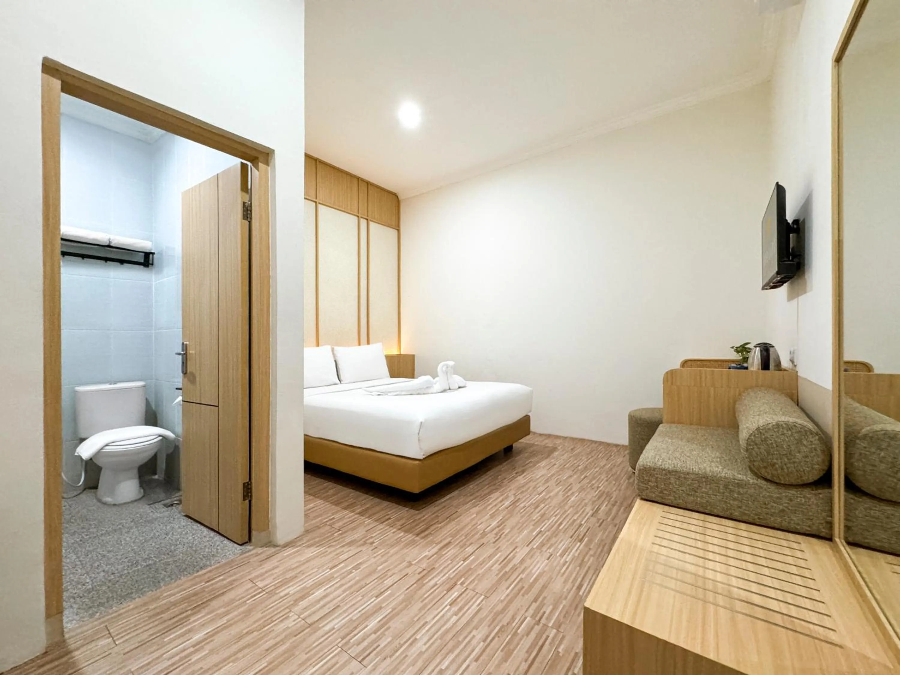 Bed in Masri Living by Daphna Management