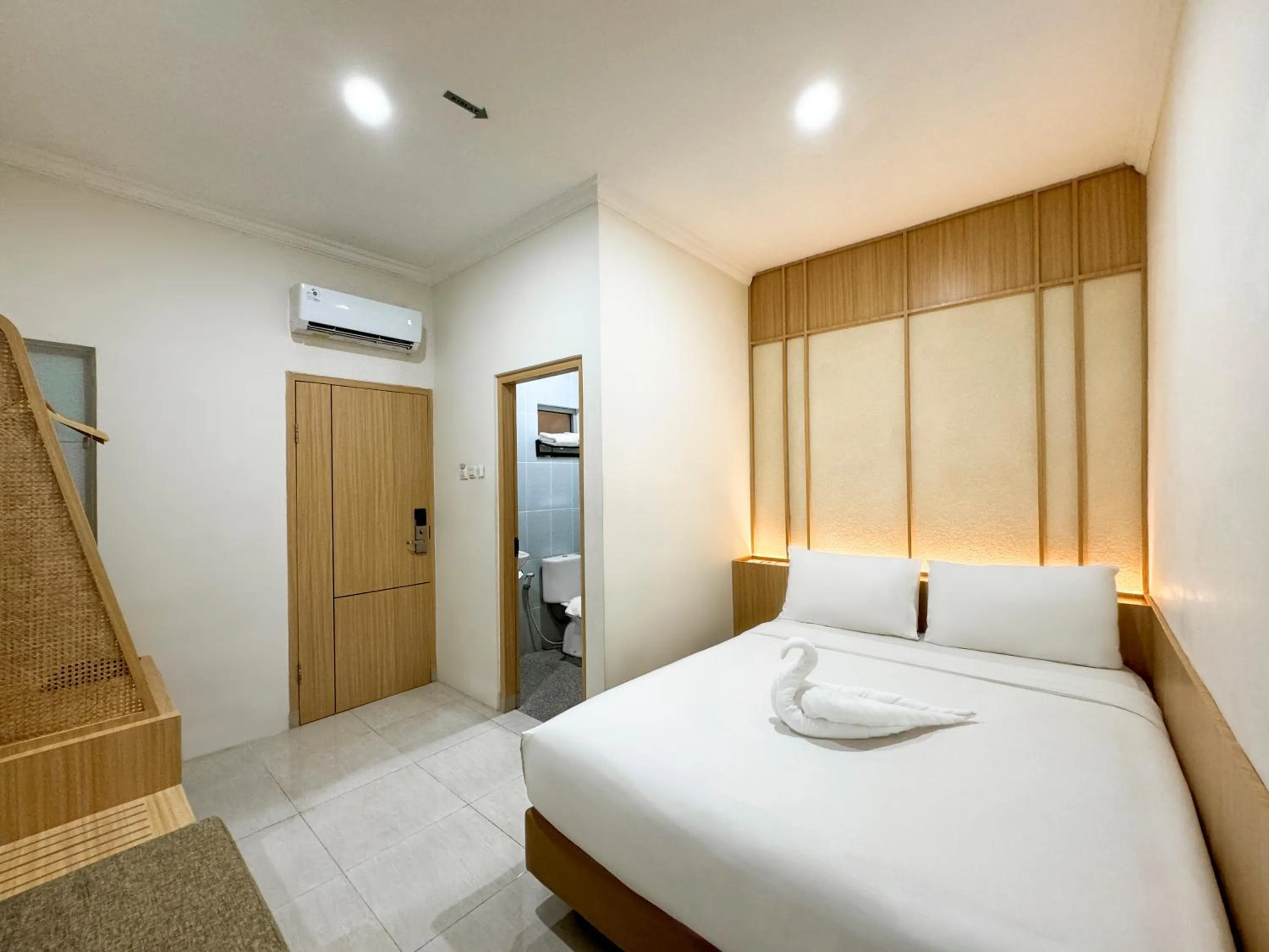 Bed in Masri Living by Daphna Management