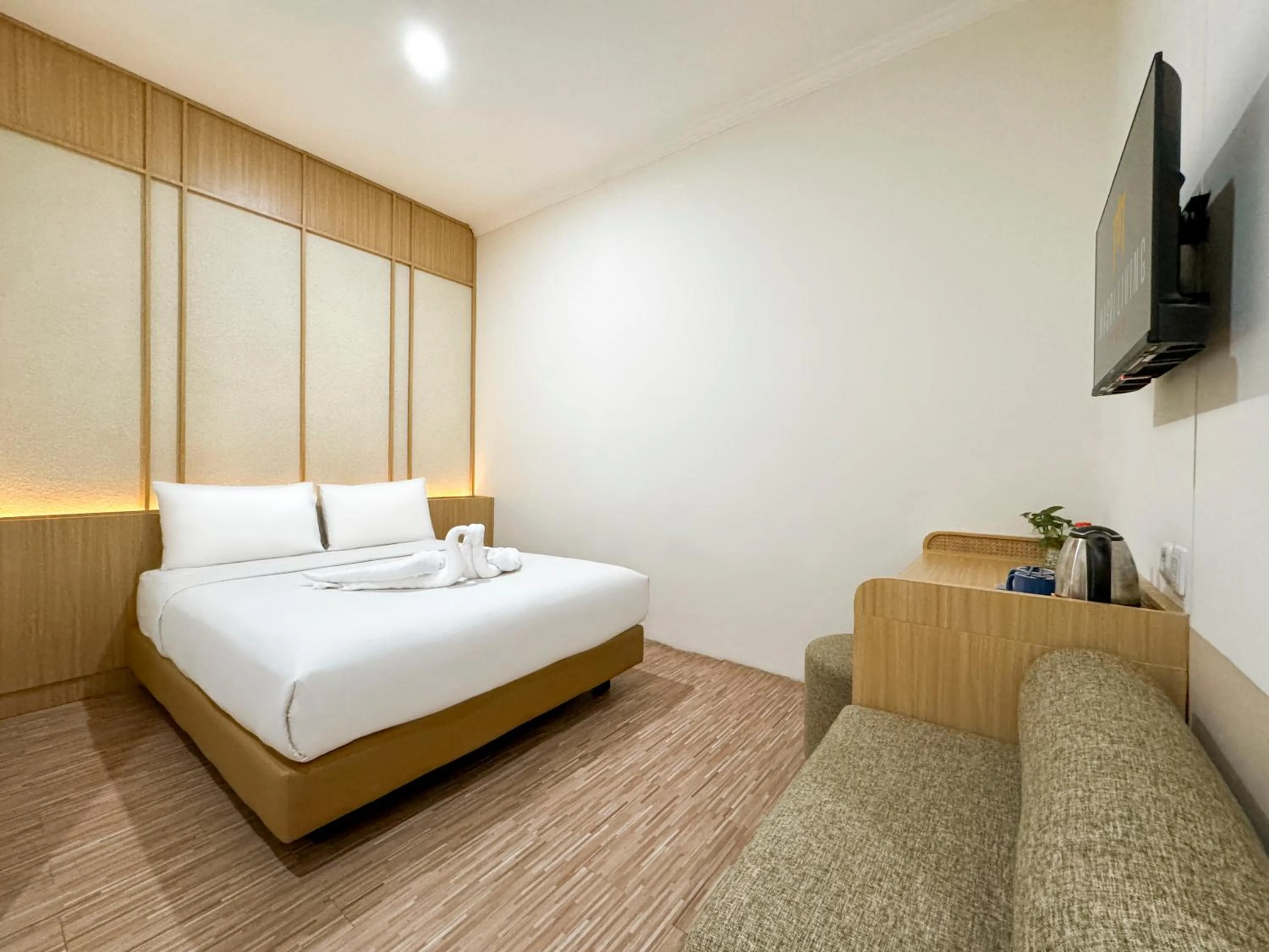 Bed in Masri Living by Daphna Management