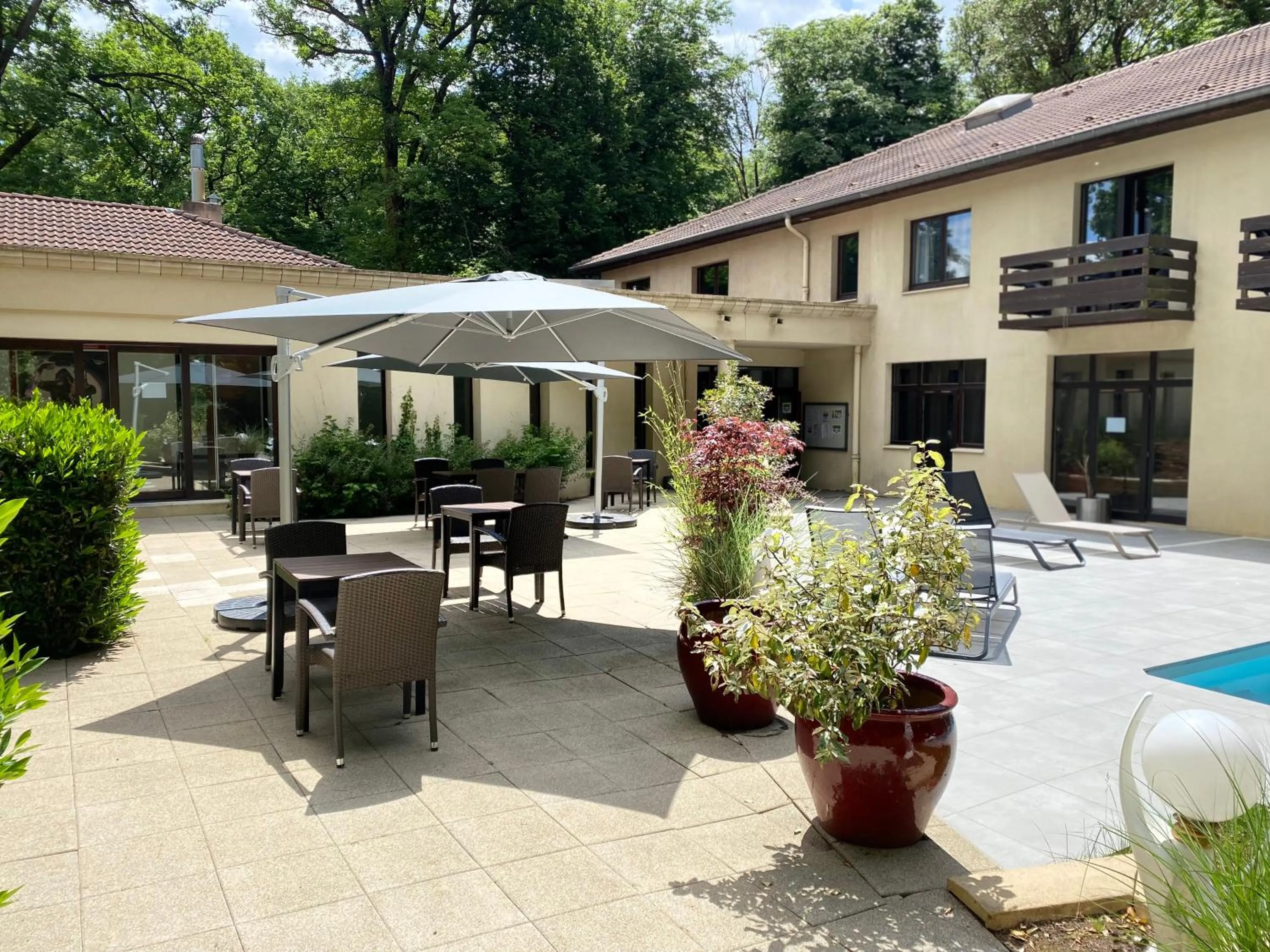 Swimming pool in Enzo Hôtels - ST Eloy Metz Amneville By Kyriad Direct