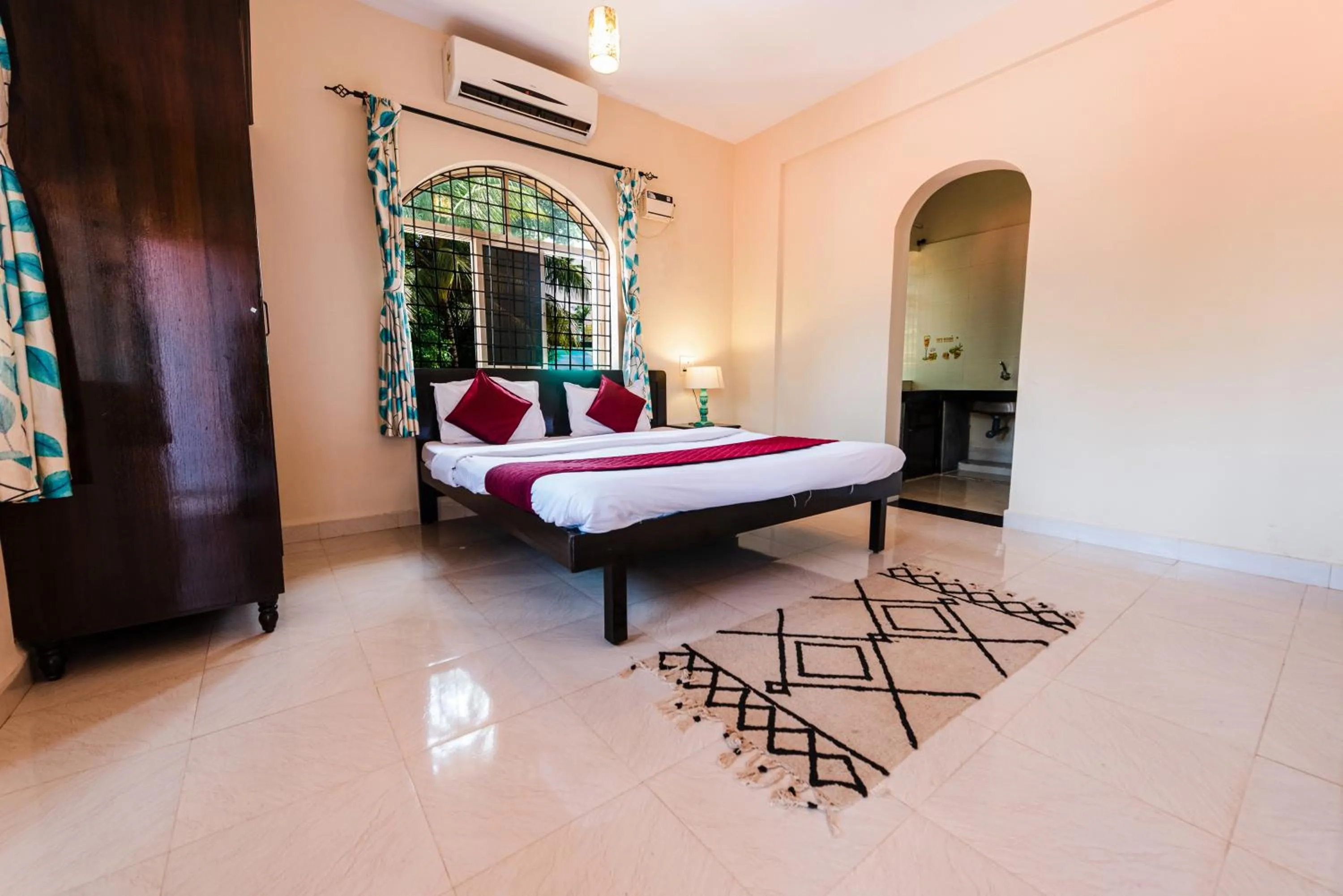 Bedroom in Hotel La Paulo's Near Beach Resort