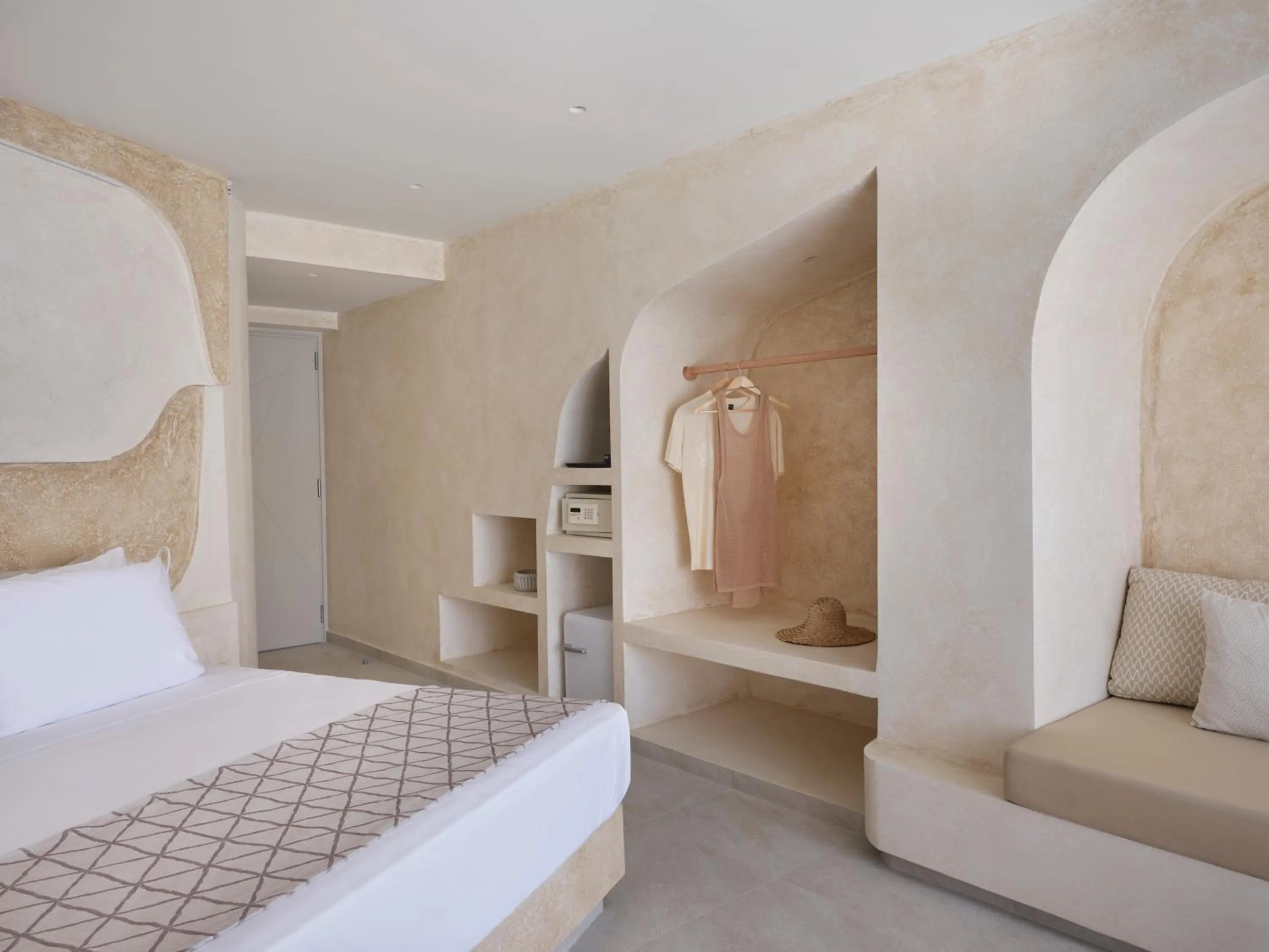 Bed in Heyday Luxury Suites