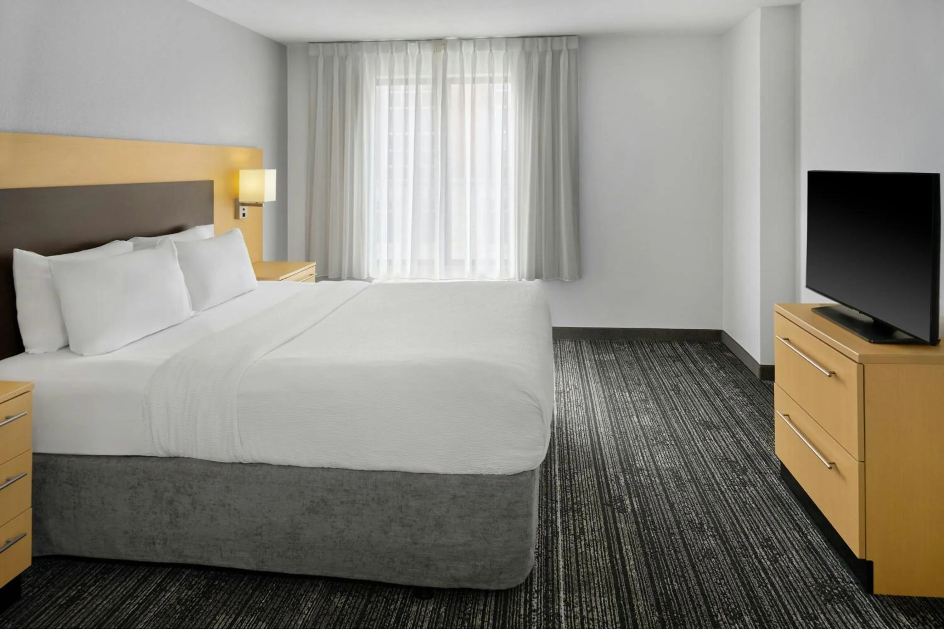 Bedroom, Bed in TownePlace Suites by Marriott Lawrence Downtown