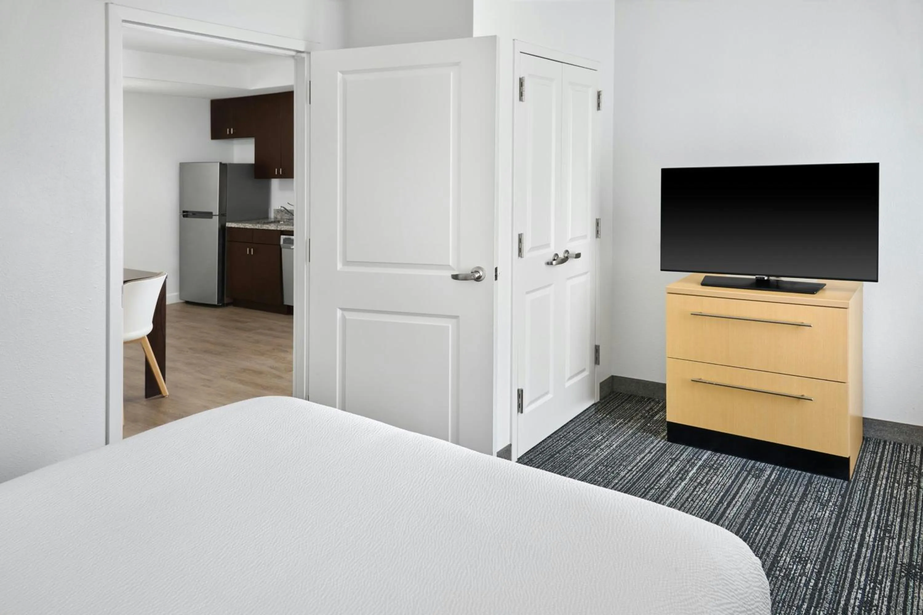 Bedroom, Bed in TownePlace Suites by Marriott Lawrence Downtown