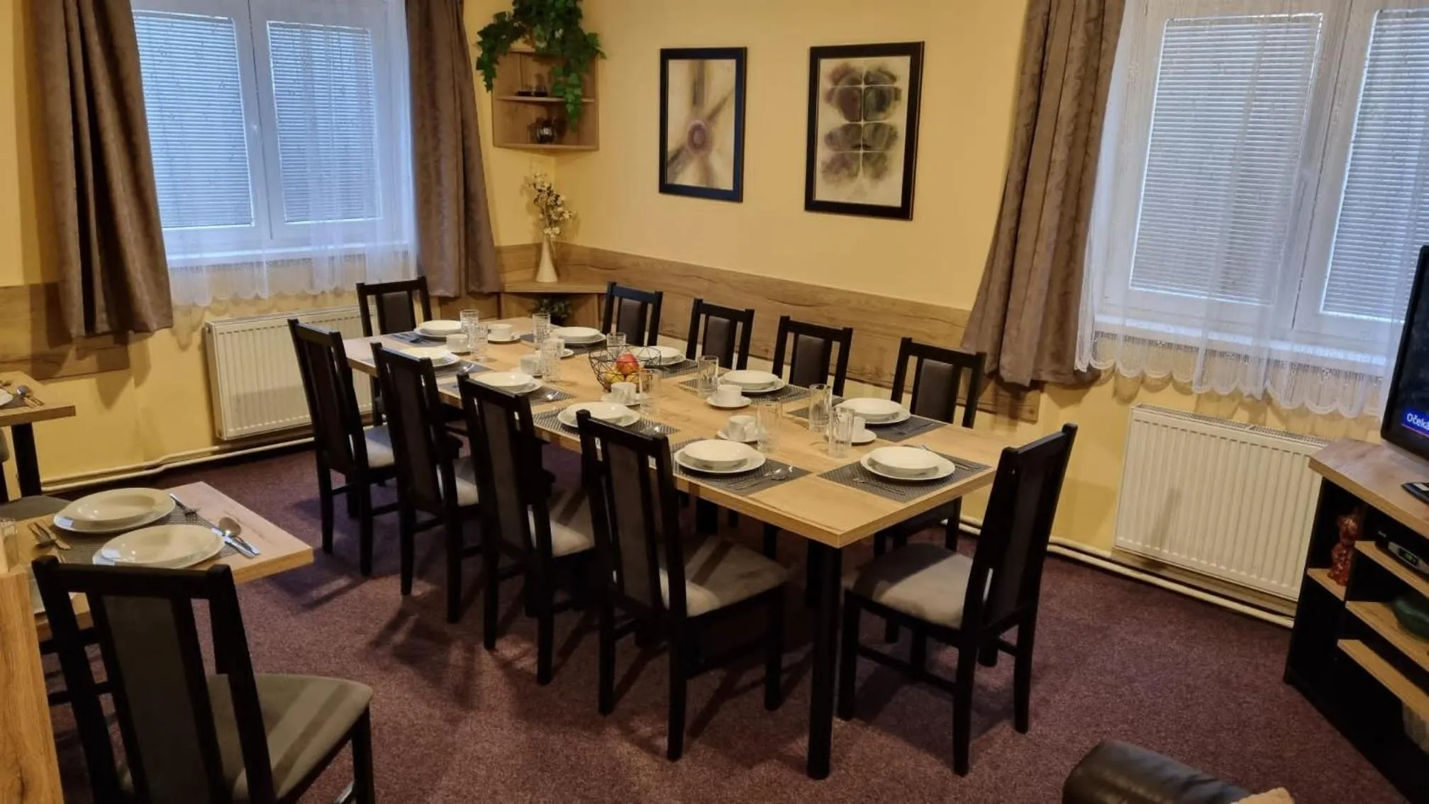 Communal lounge/ TV room in Horská chata Ježek