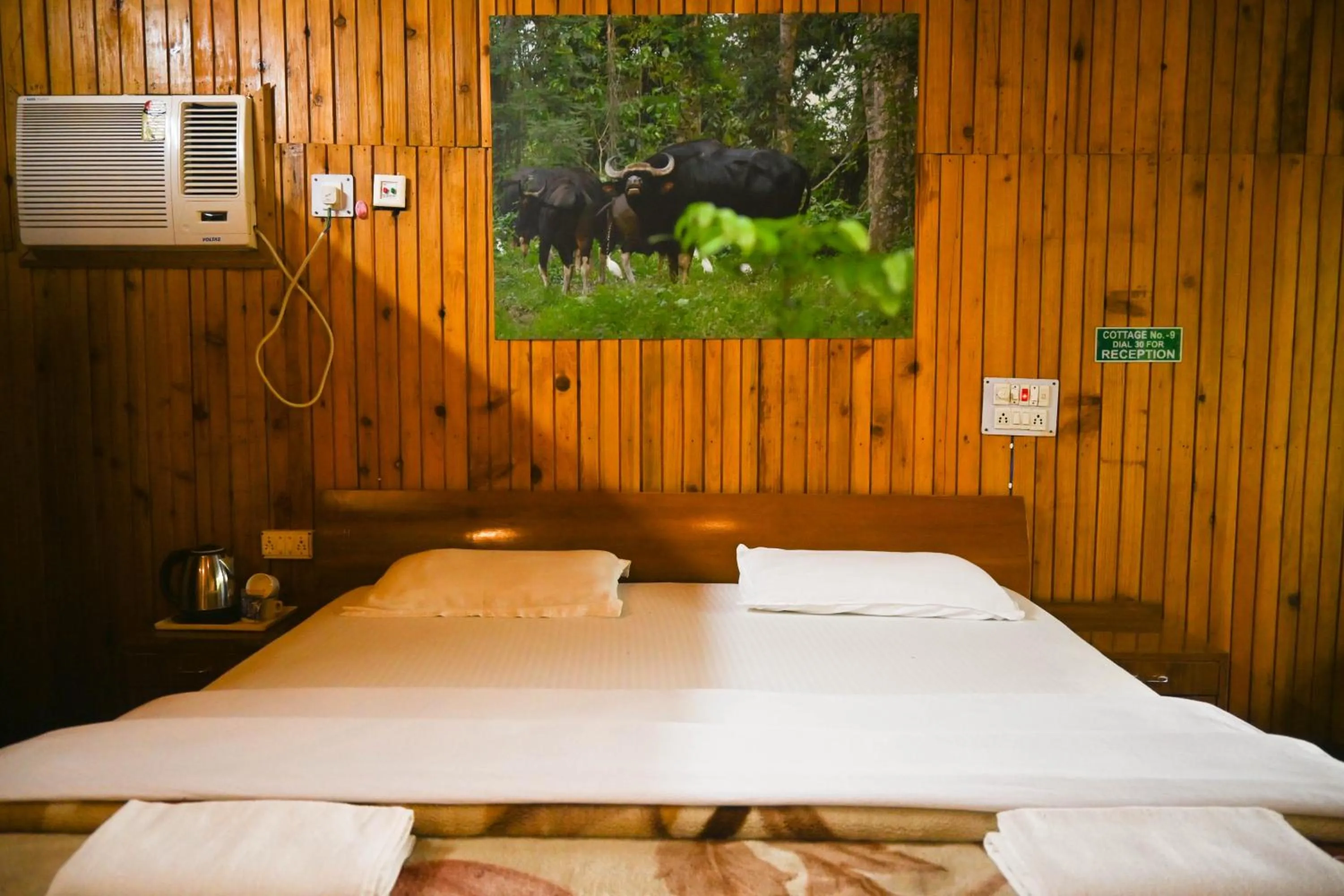 Bed in Aranya Jungle Resorts