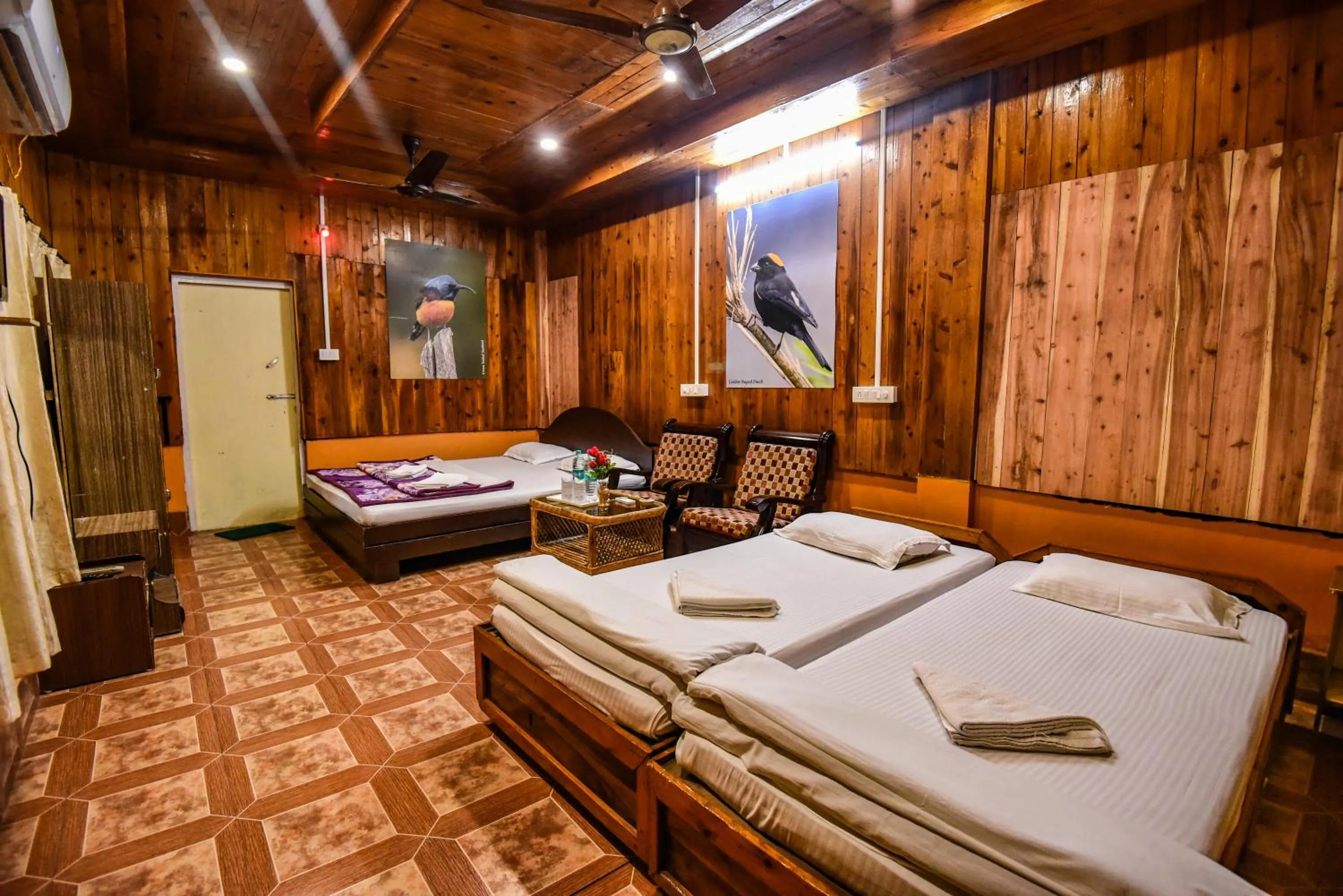Bed in Aranya Jungle Resorts