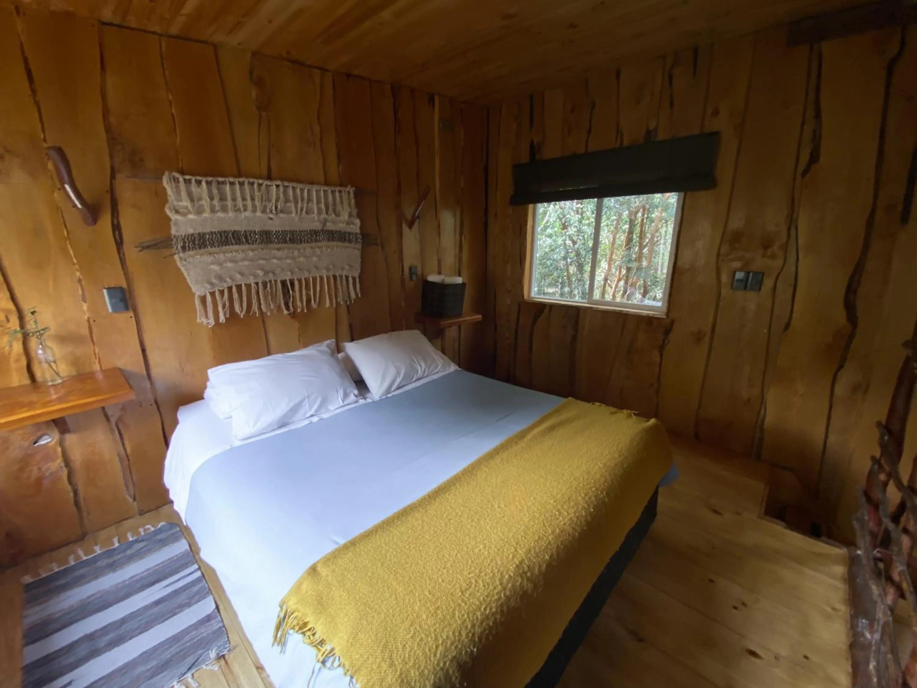 Bed in Cabañas Ensenada Bosque Nativo