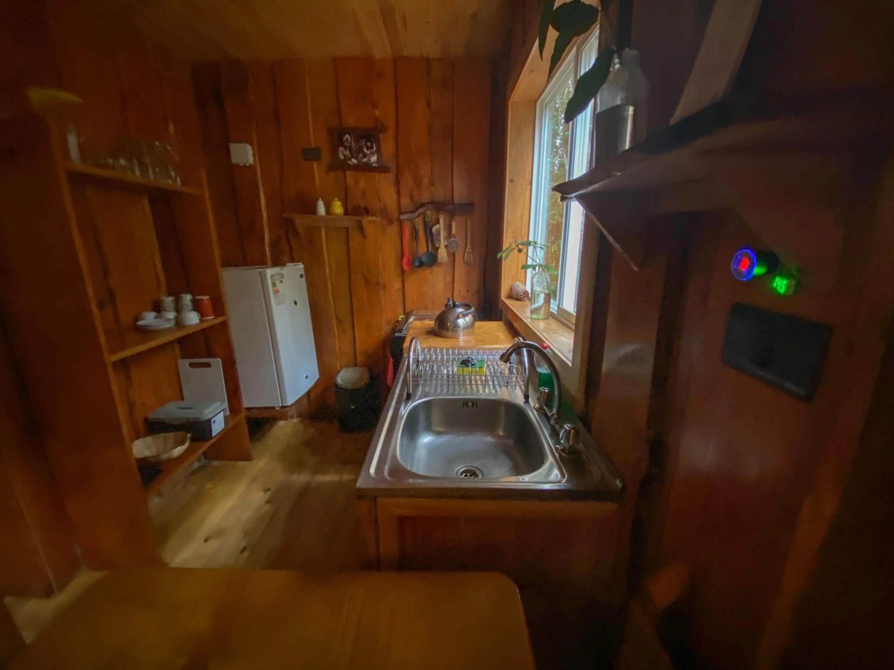 Kitchen or kitchenette in Cabañas Ensenada Bosque Nativo