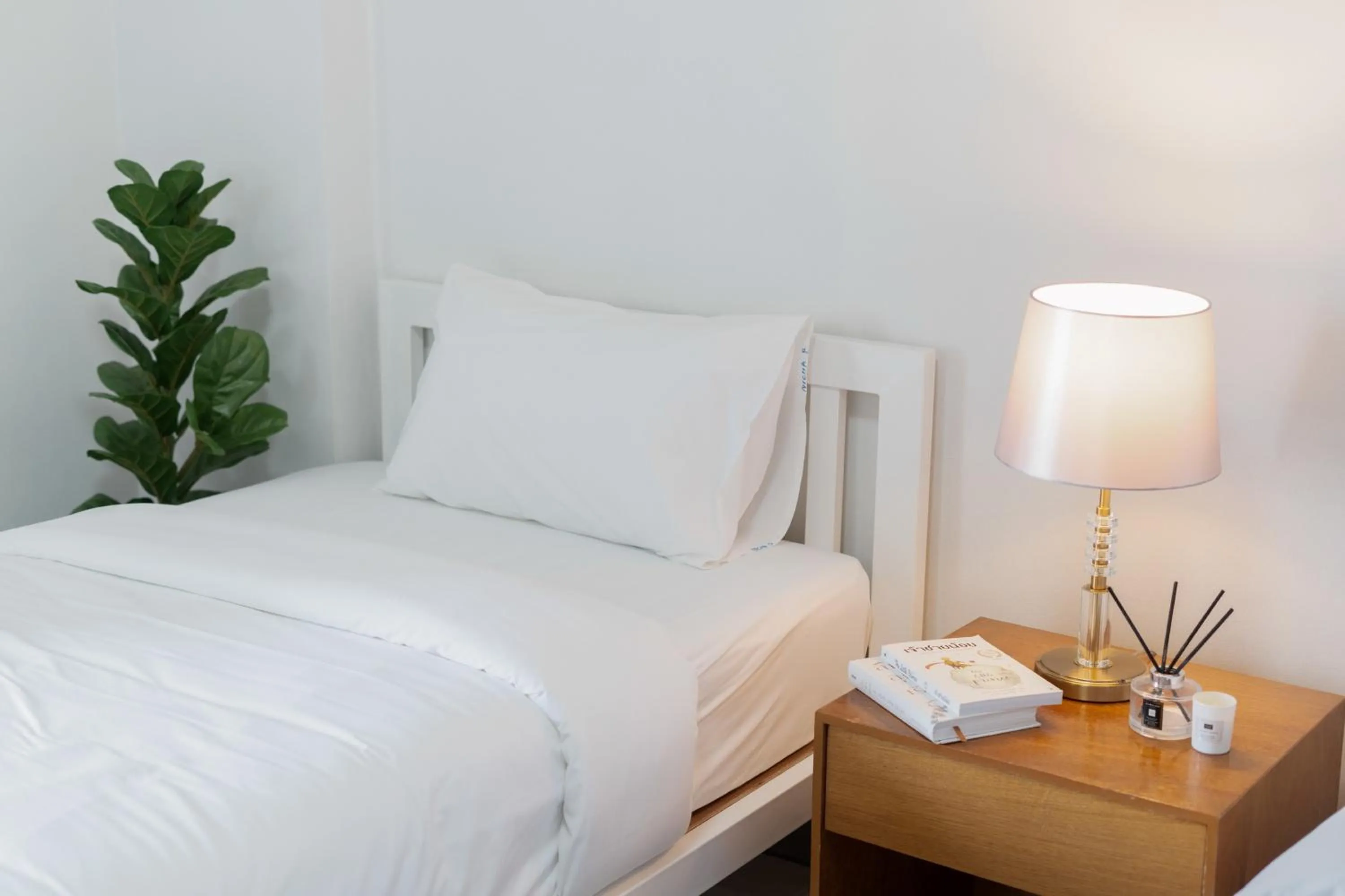 Bed in Nicha Residence Hotel