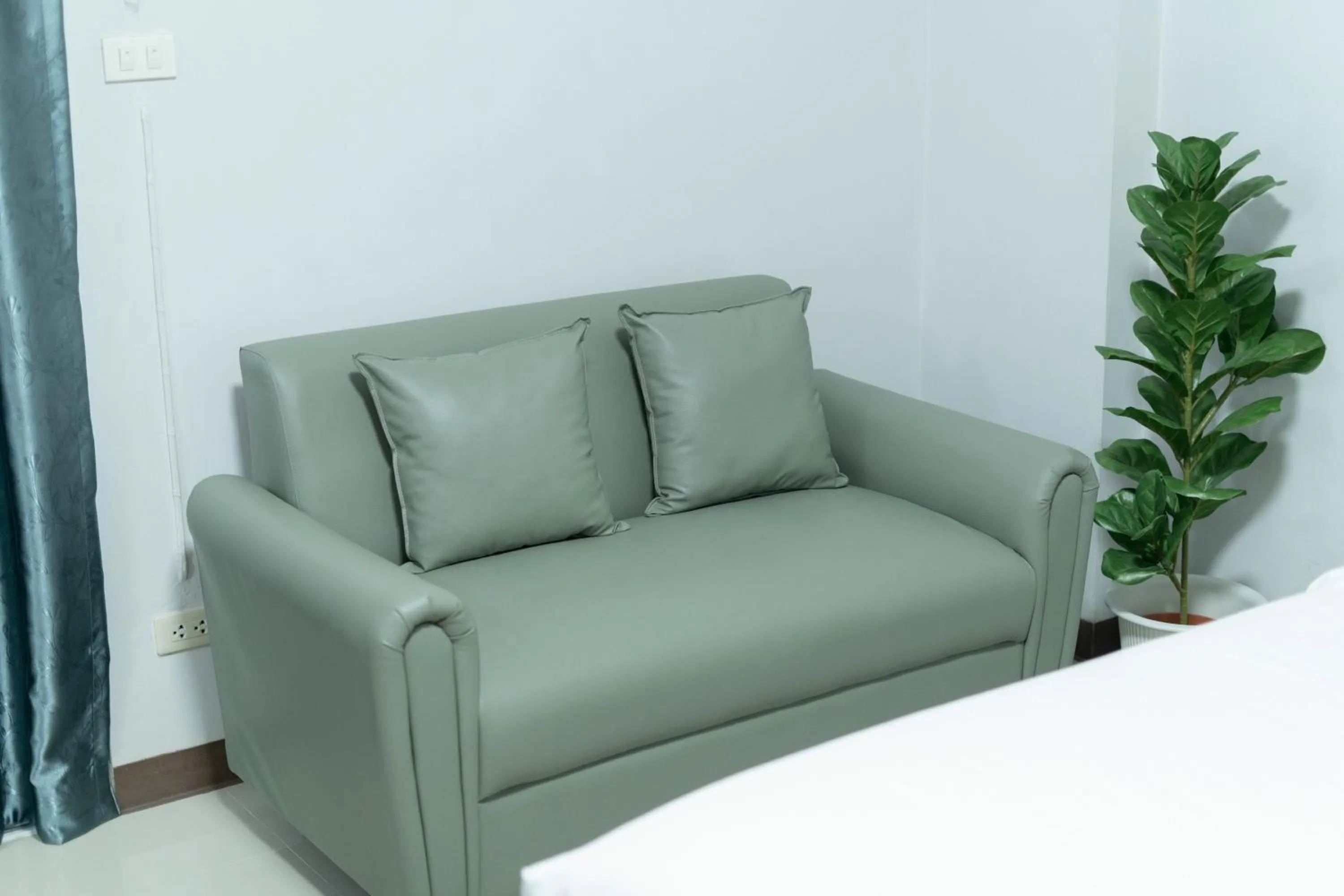 Seating area in Nicha Residence Hotel