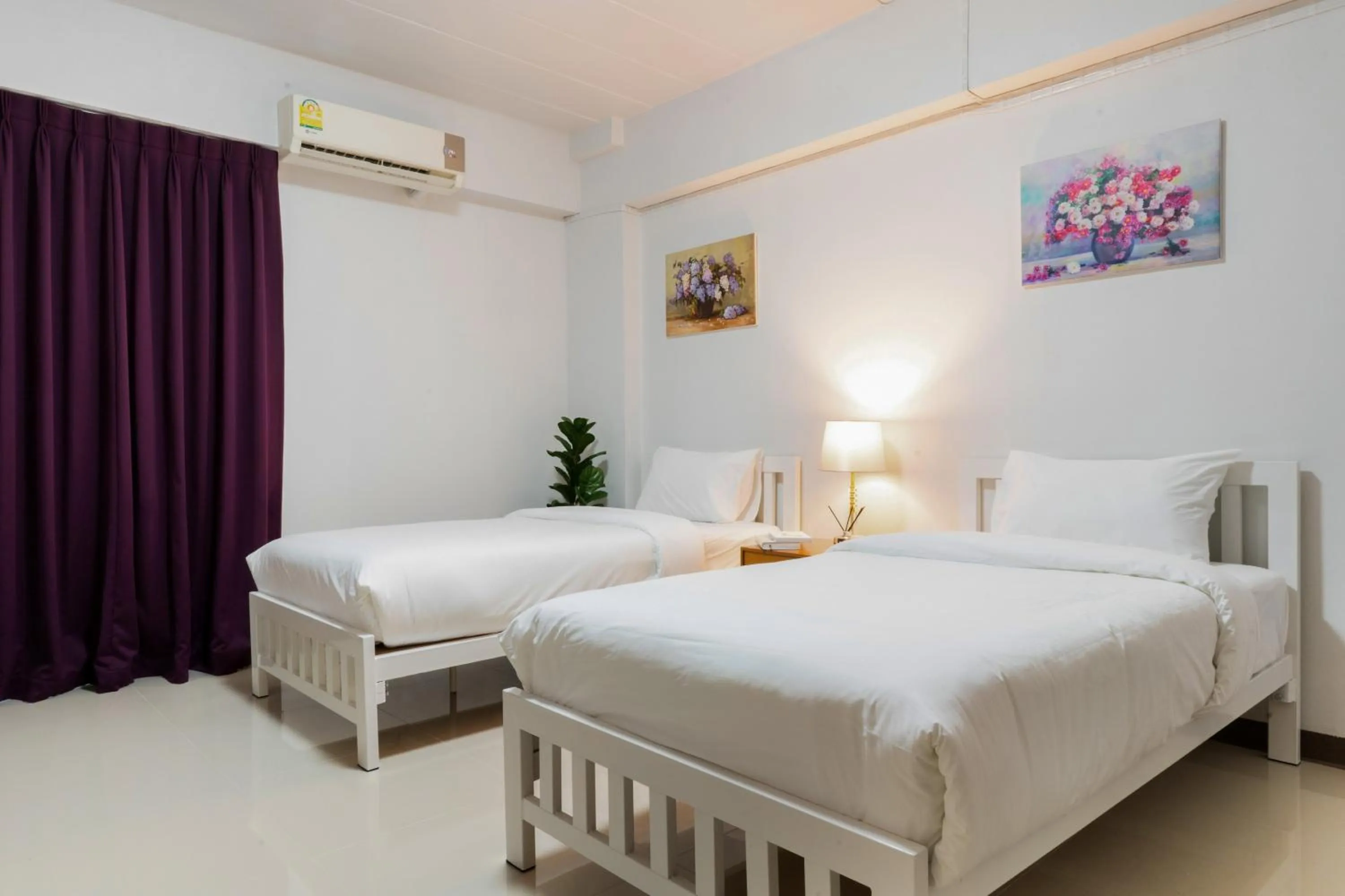 Bed in Nicha Residence Hotel