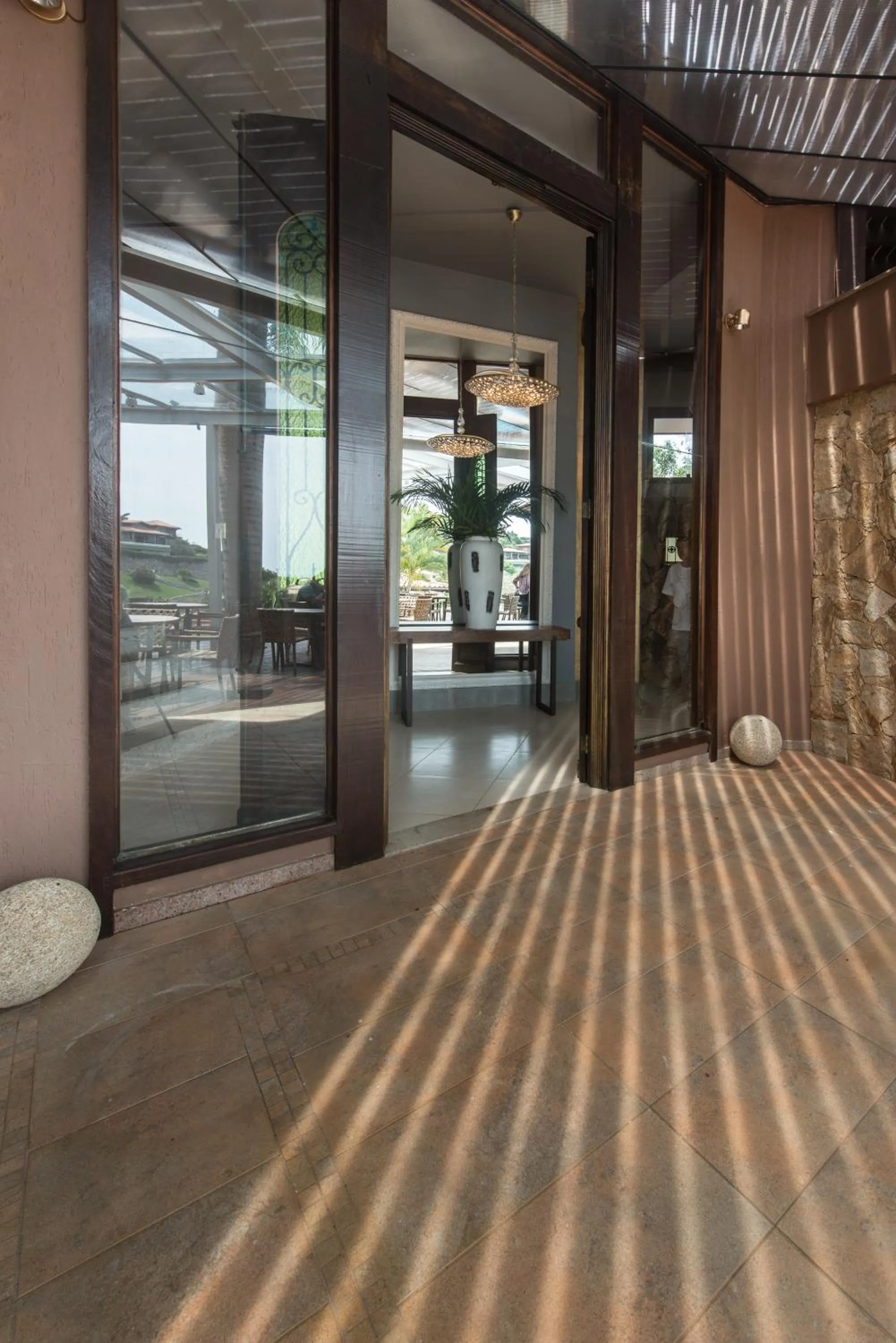 Communal lounge/ TV room in Ilha Branca Exclusive Hotel