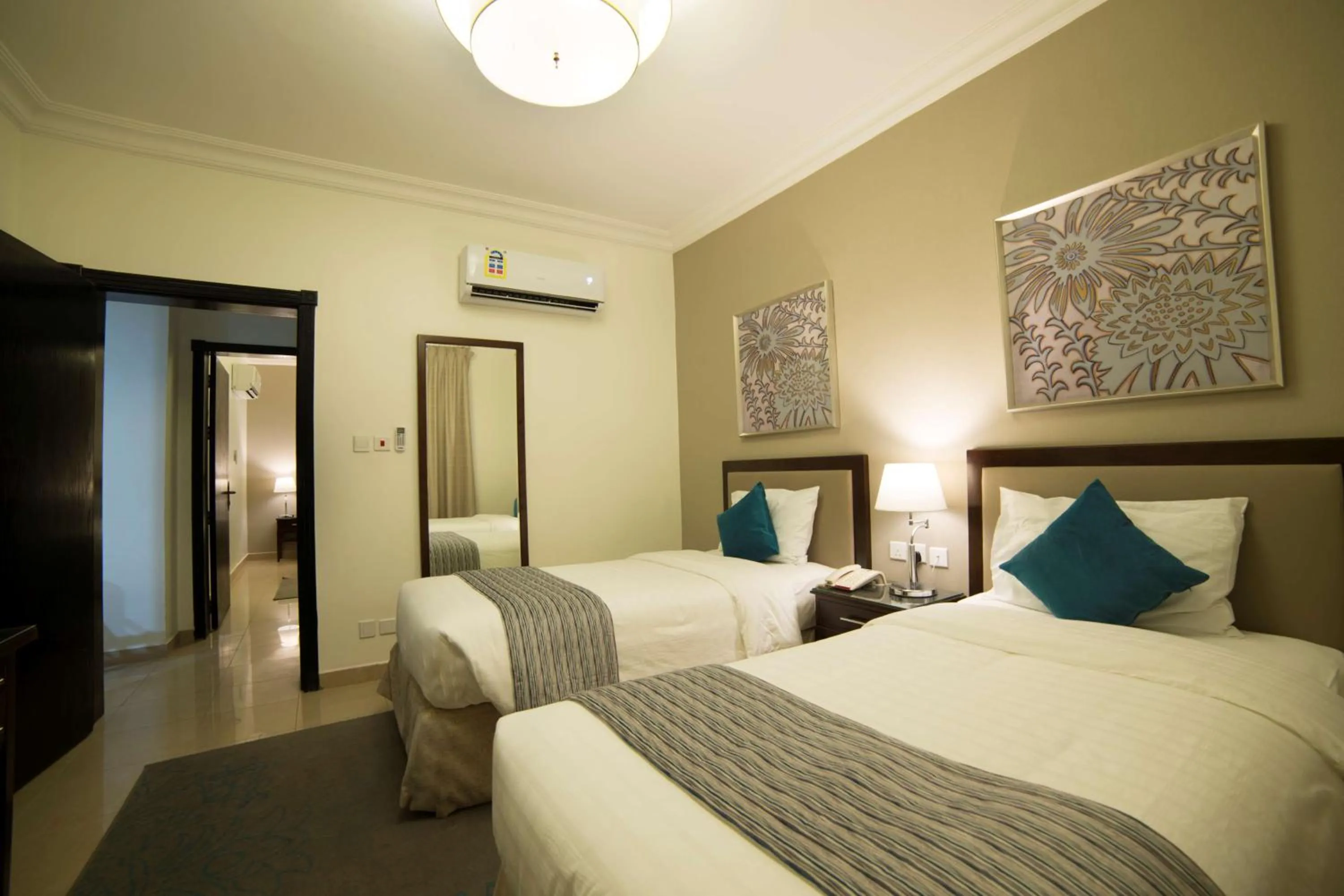 Photo of the whole room, Bed in Taskeen Inn, Formerly Tulip Inn