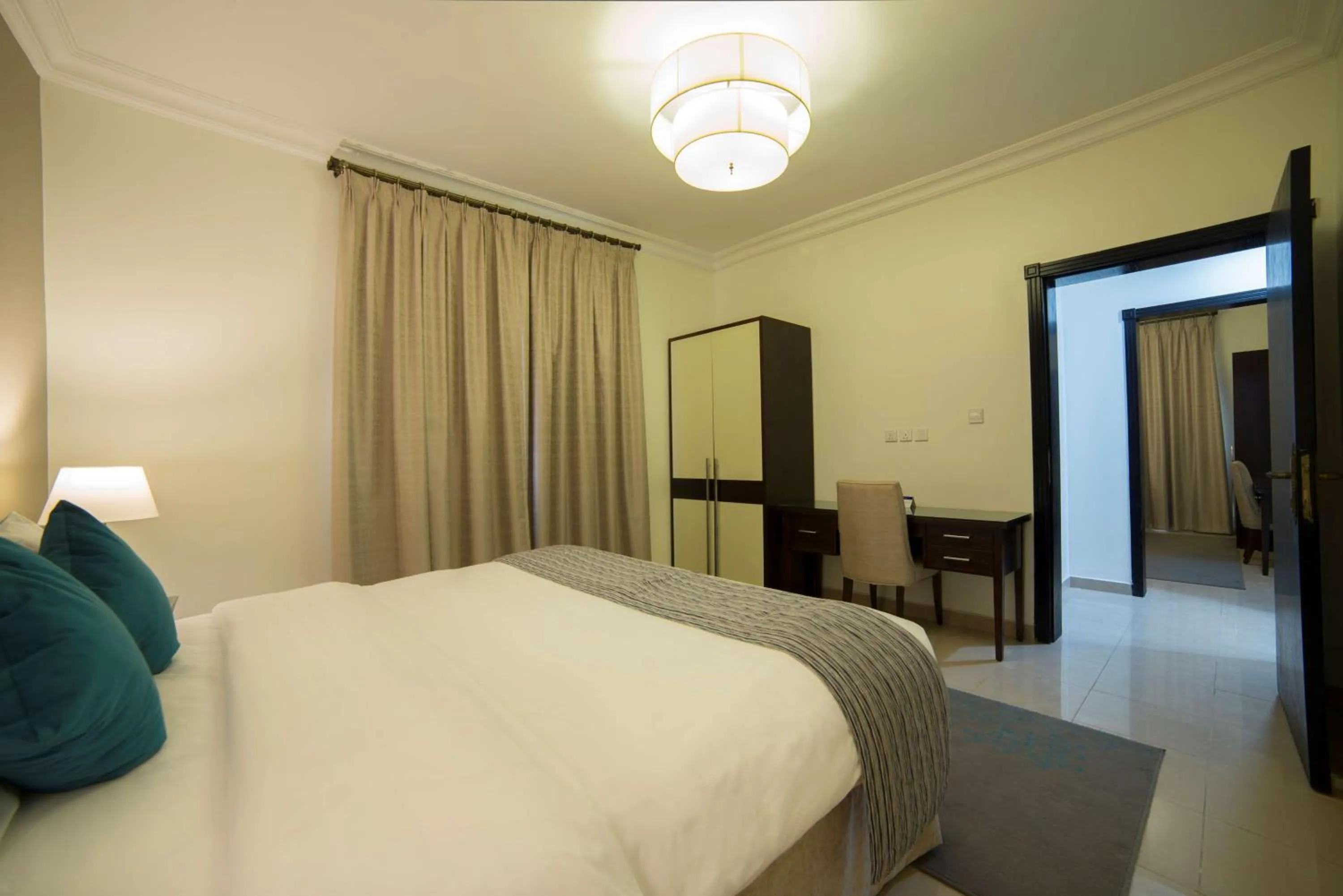 Photo of the whole room, Bed in Taskeen Inn, Formerly Tulip Inn