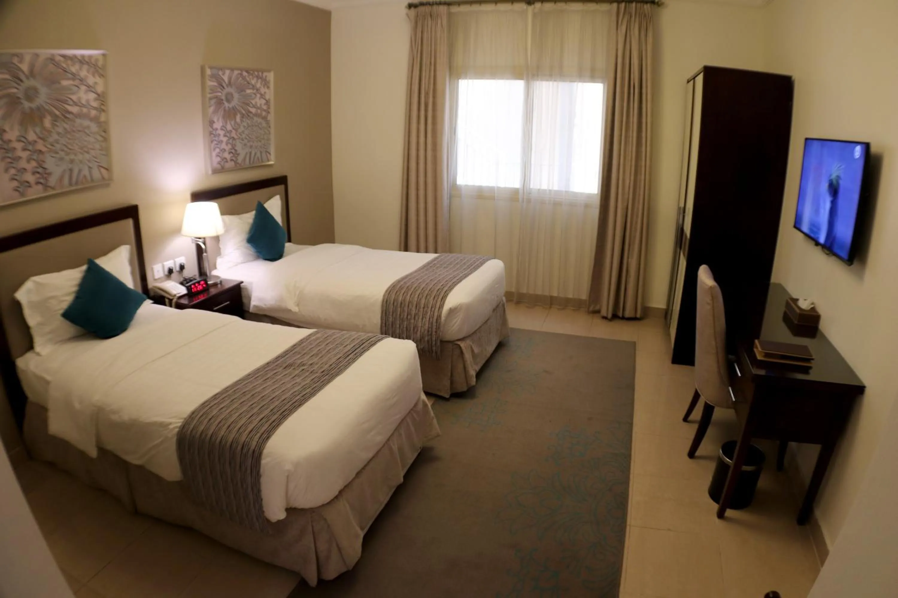 Bed in Taskeen Inn, Formerly Tulip Inn