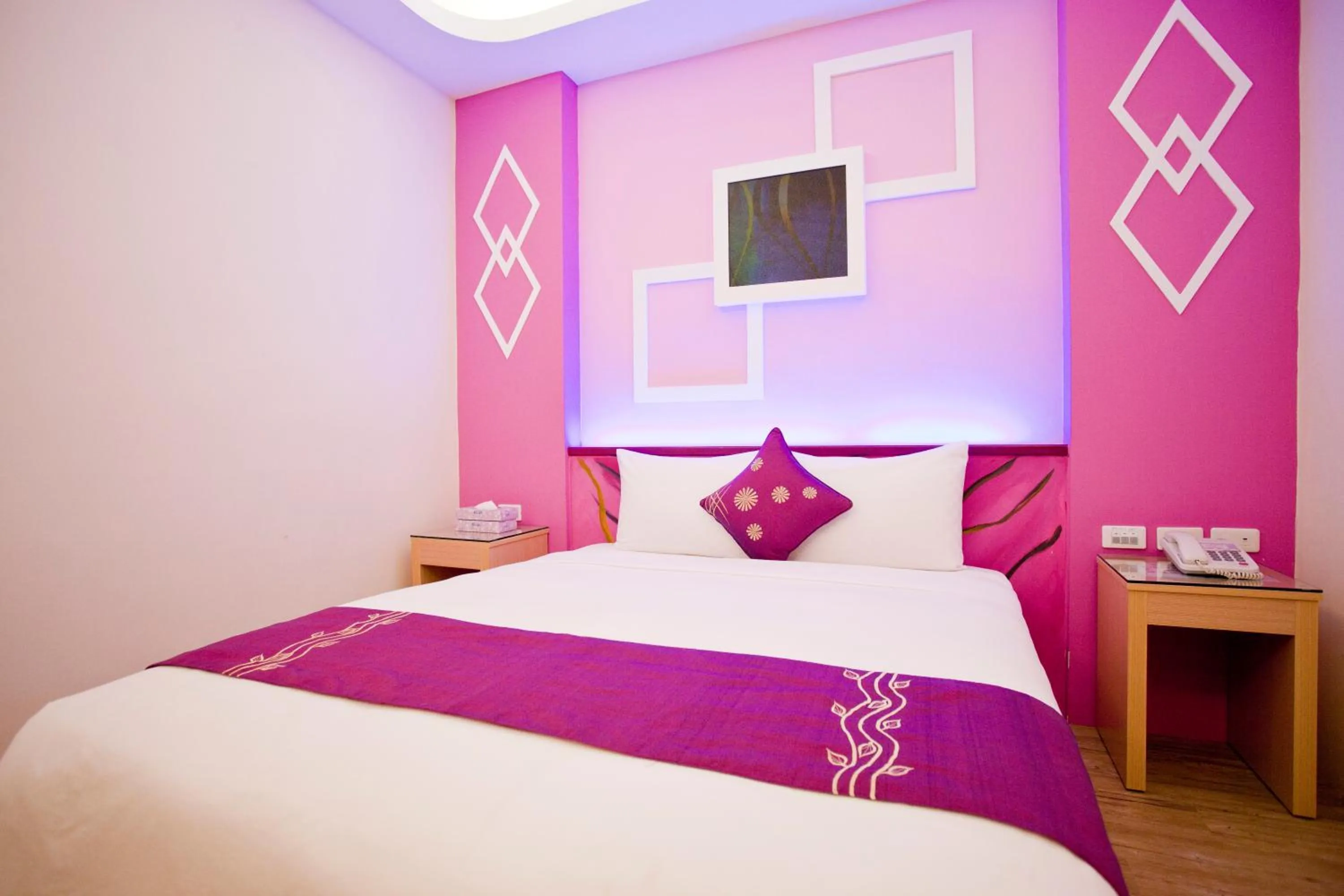 Bed in Millennium Inn