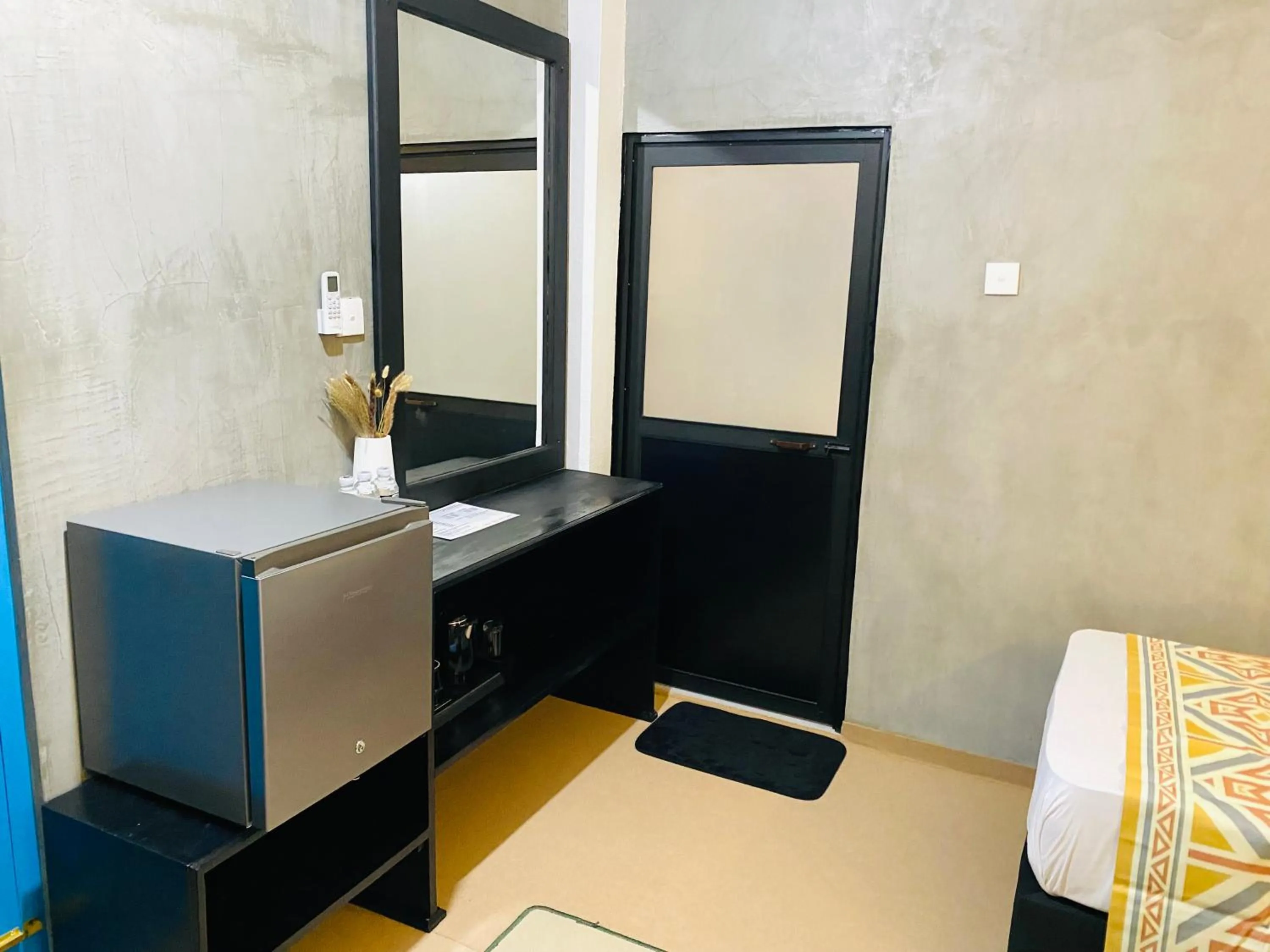 Bed in Coco Palm Villa and Cabanas