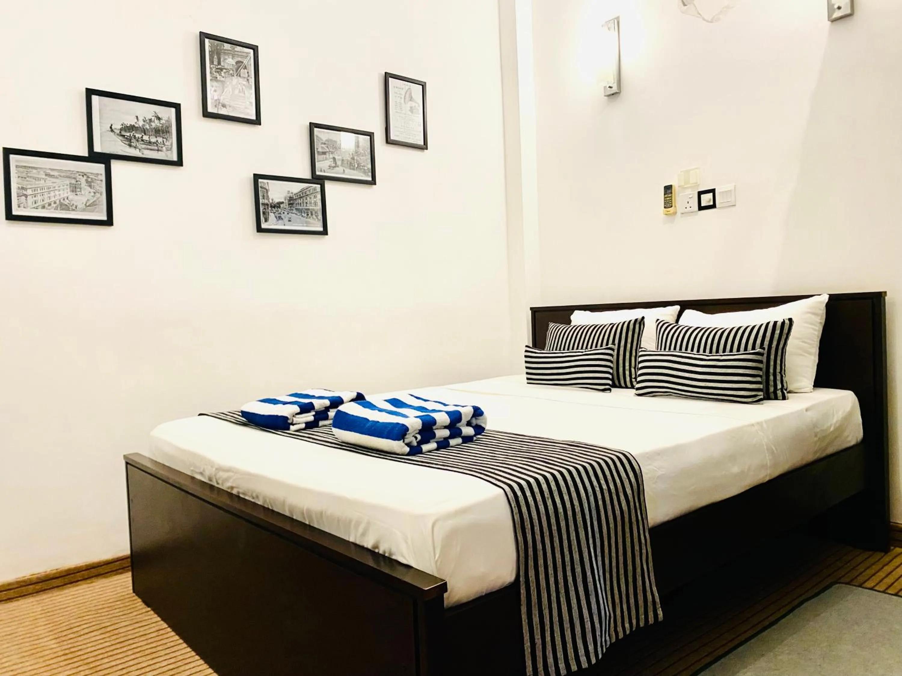 Bed in Coco Palm Villa and Cabanas