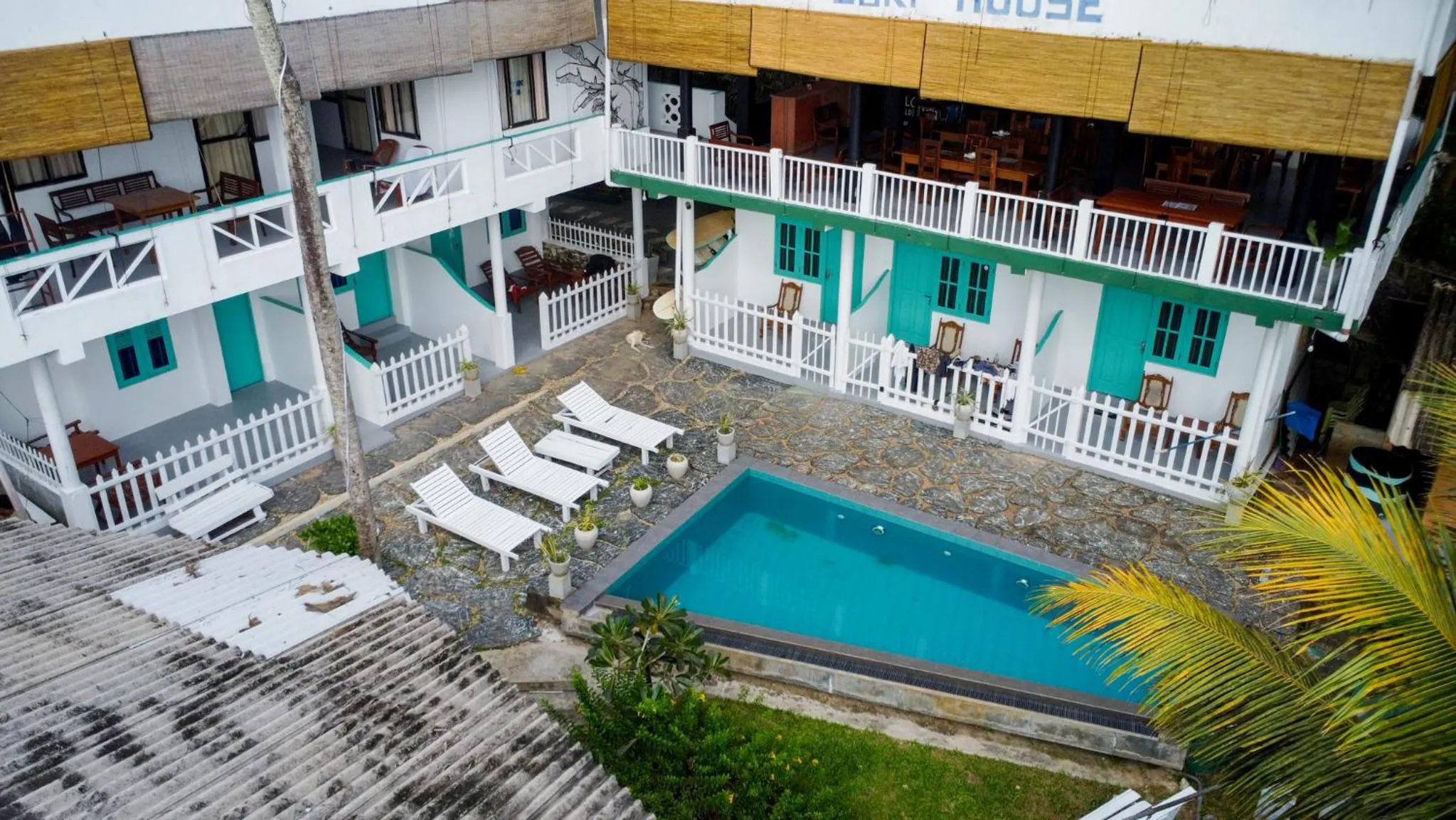 Property building in Asanka Surf House & Restaurant with pool