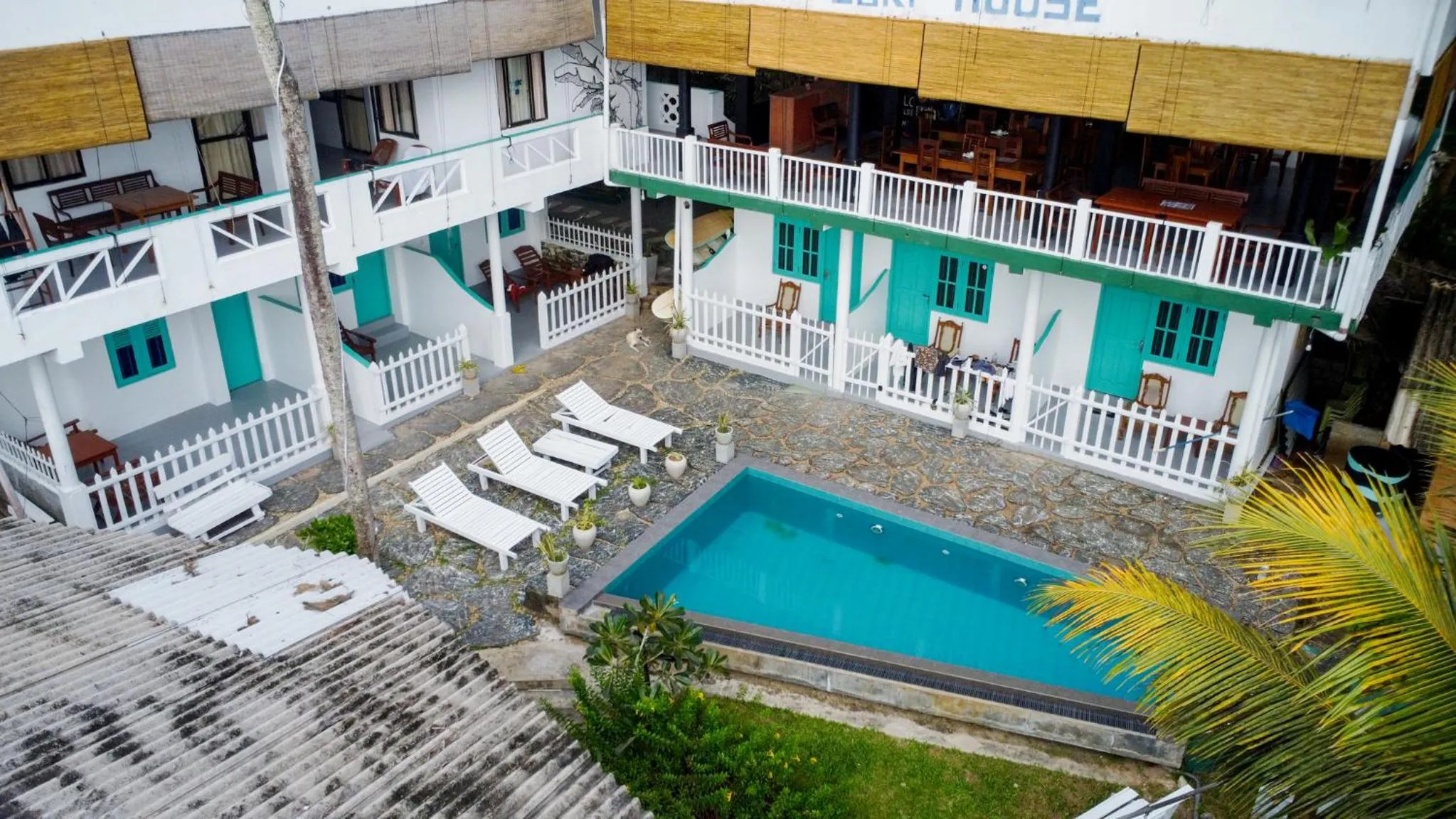 Property building in Asanka Surf House & Restaurant with pool