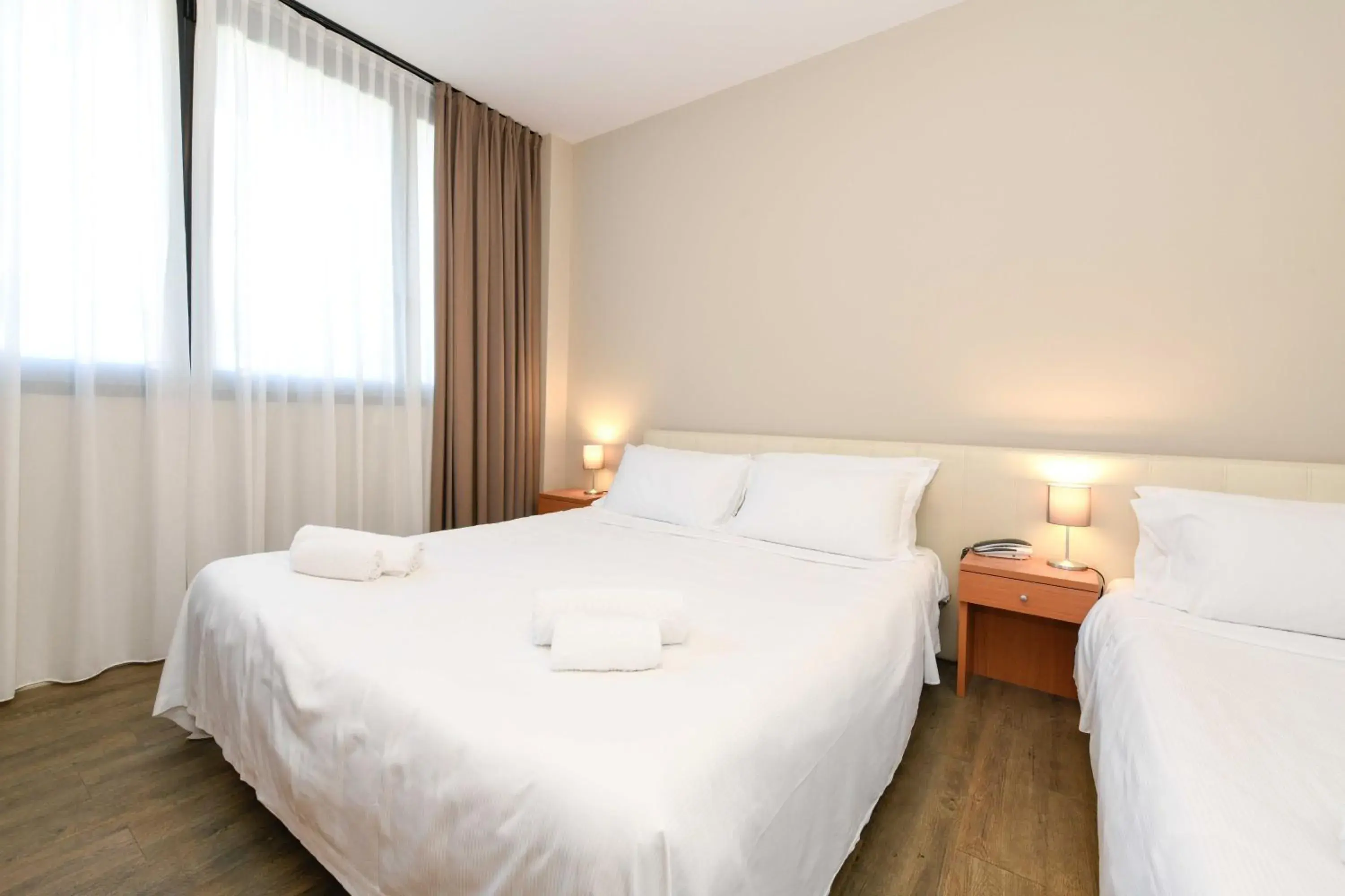 Classic Queen Room with Queen Bed and Single Bed in Best Western Hotel Garda Classic Queen Room with Queen Bed and Single Bed in Best Western Hotel Garda