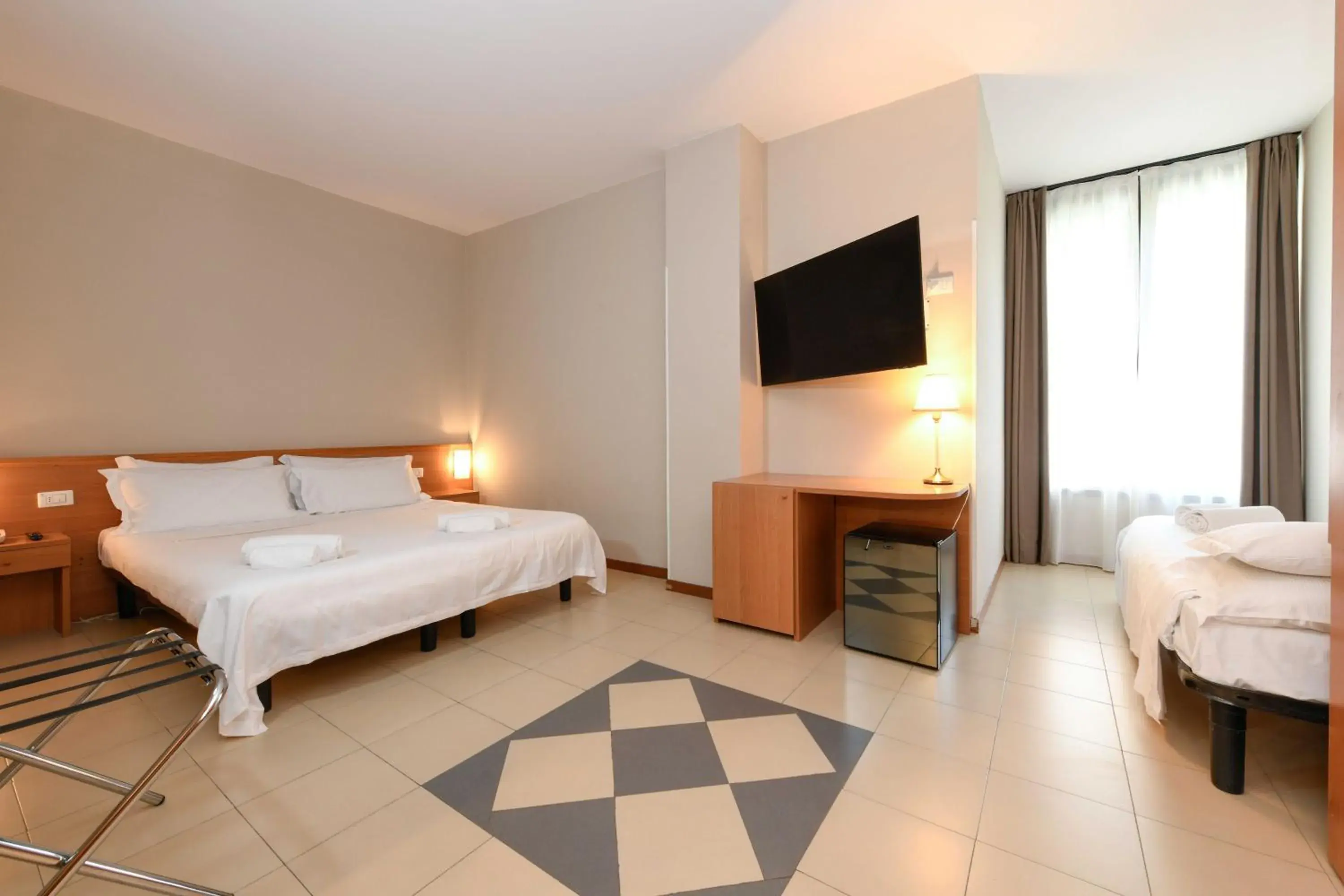 Classic Family Room with One Queen Bed and One Single Bed - Non-Smoking in Best Western Hotel Garda Classic Family Room with One Queen Bed and One Single Bed - Non-Smoking in Best Western Hotel Garda