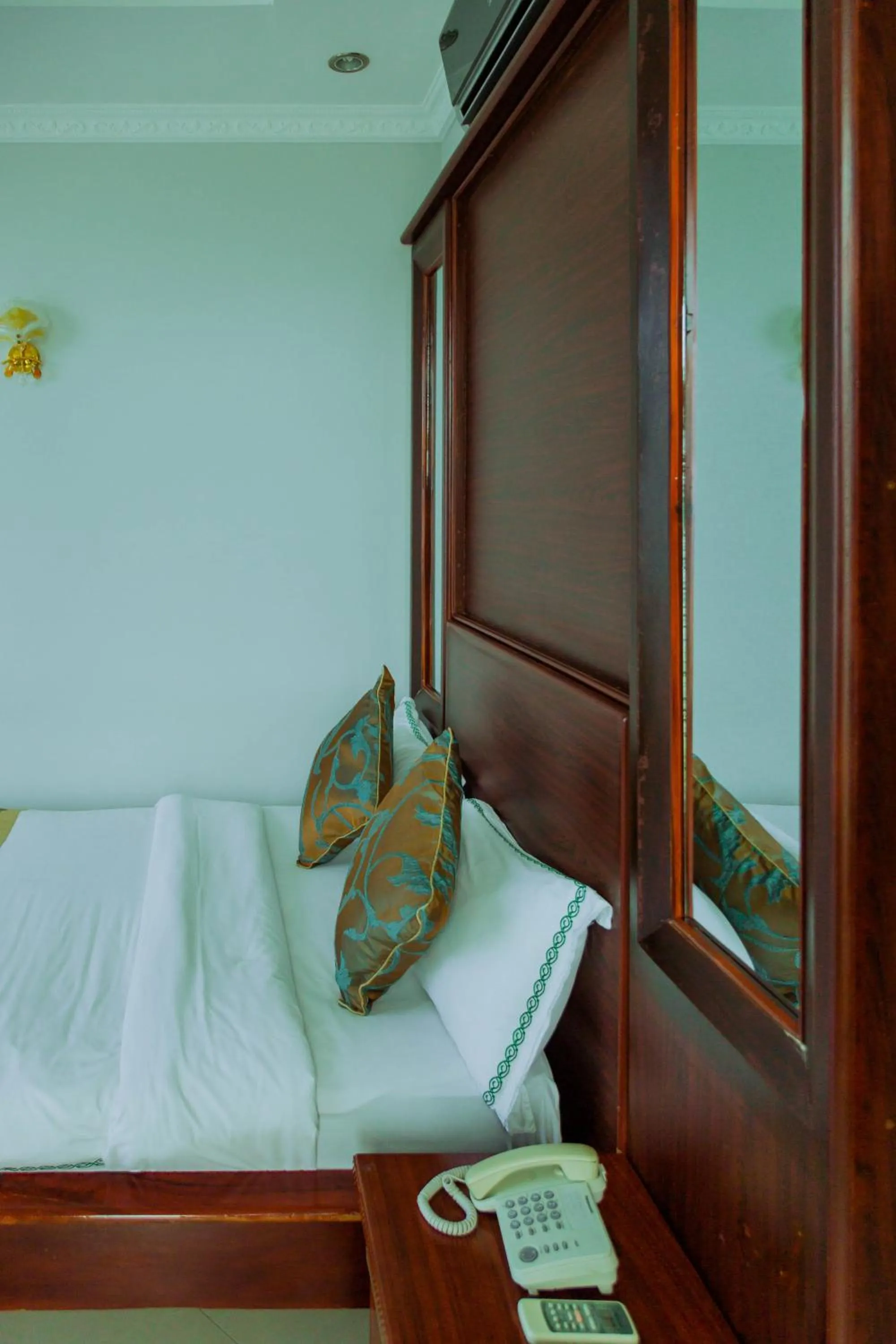 Bed in Greenlight Hotel