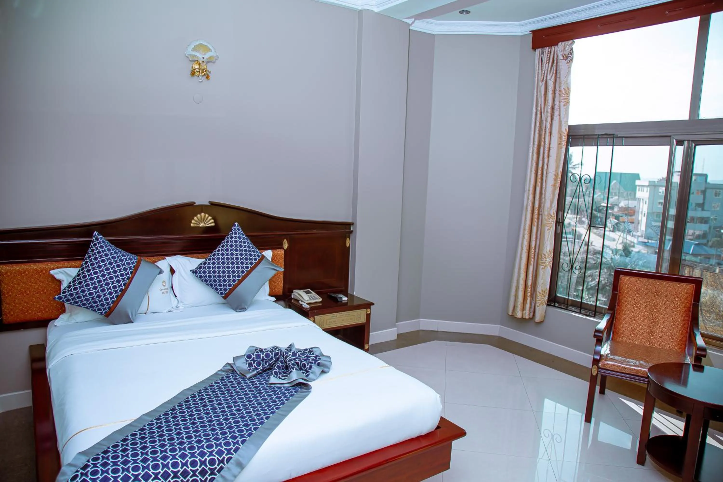 Bed in Greenlight Hotel