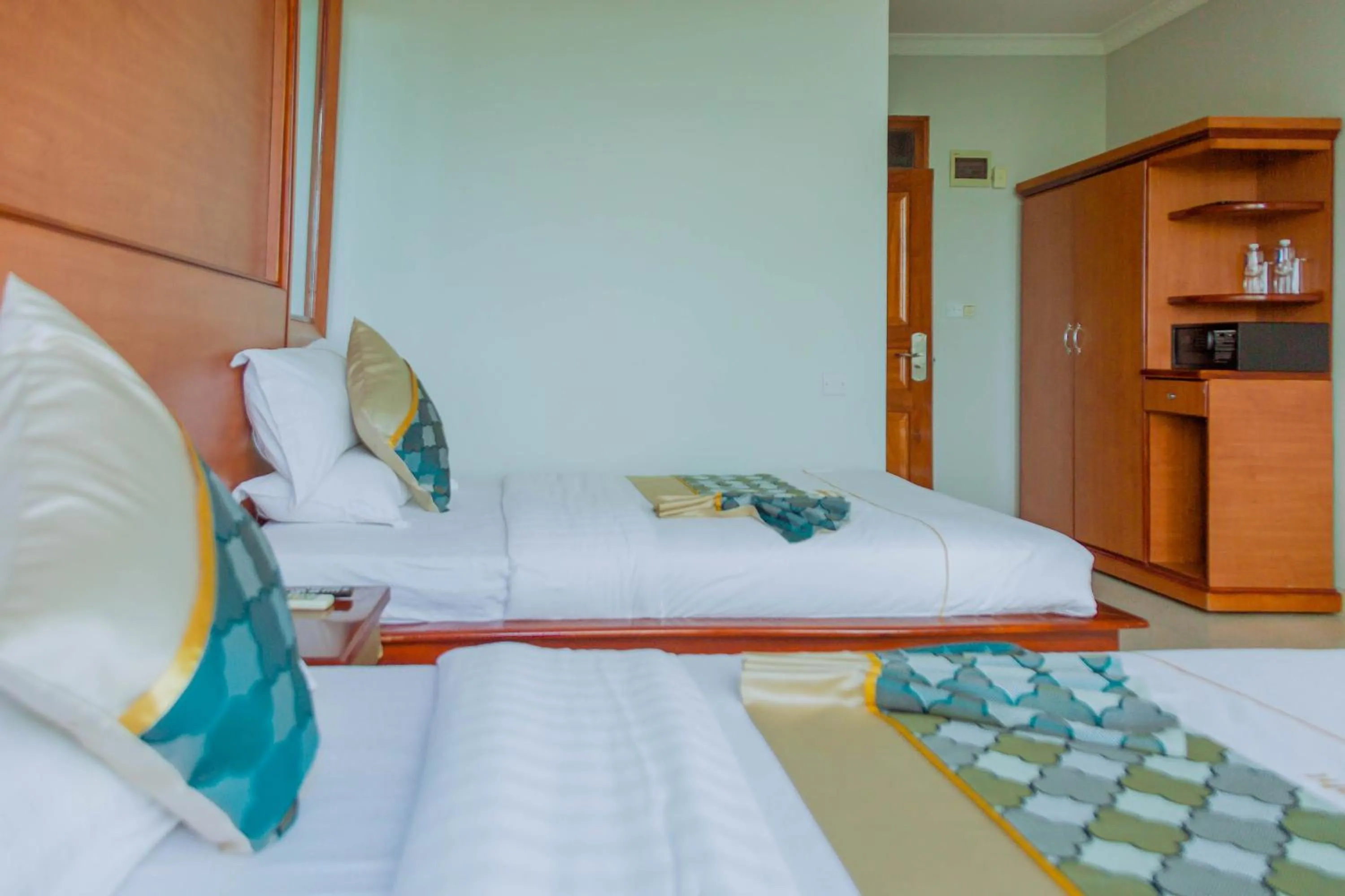 Bed in Greenlight Hotel