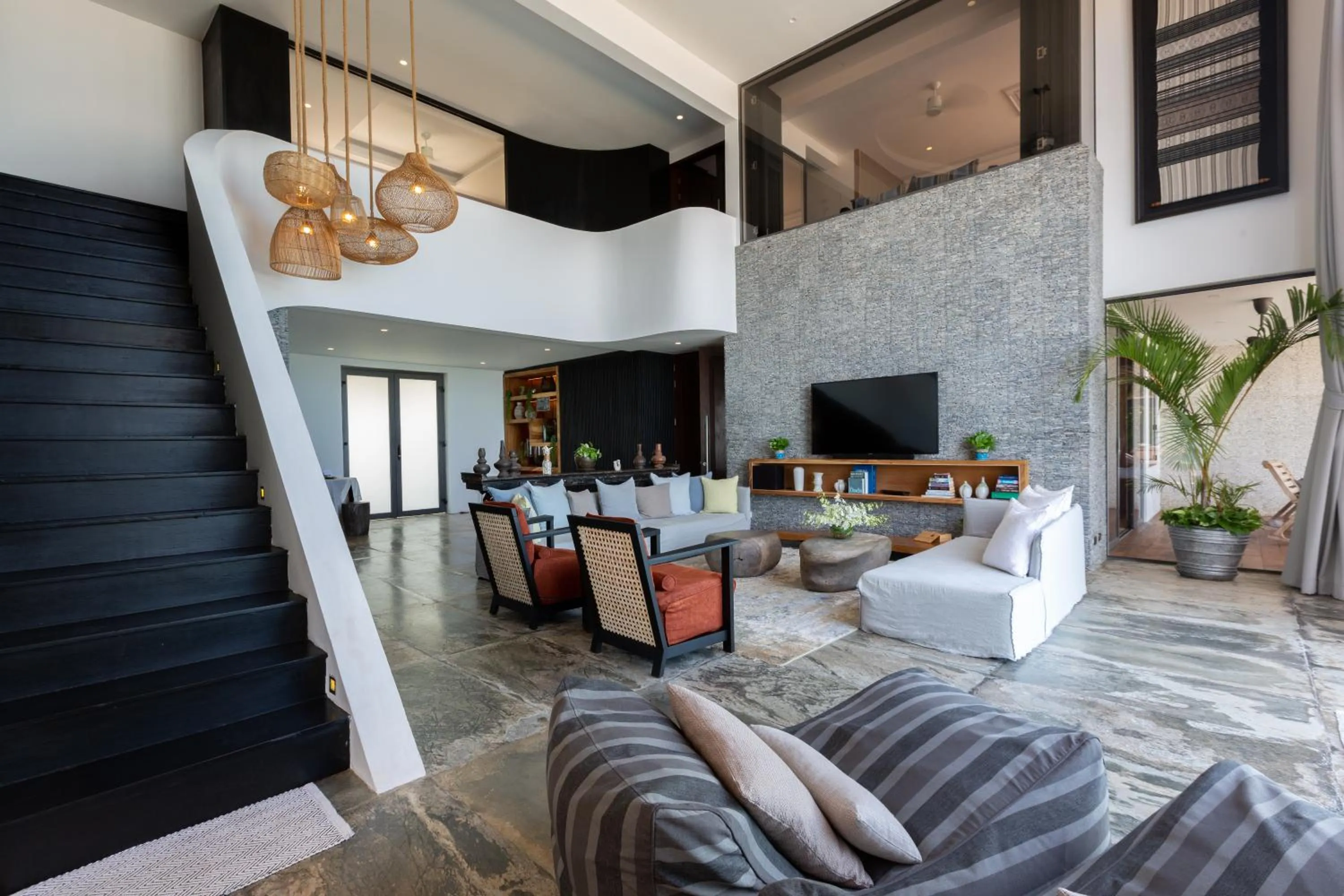 Communal lounge/ TV room in Villa U - 3BR Beachfront Haven