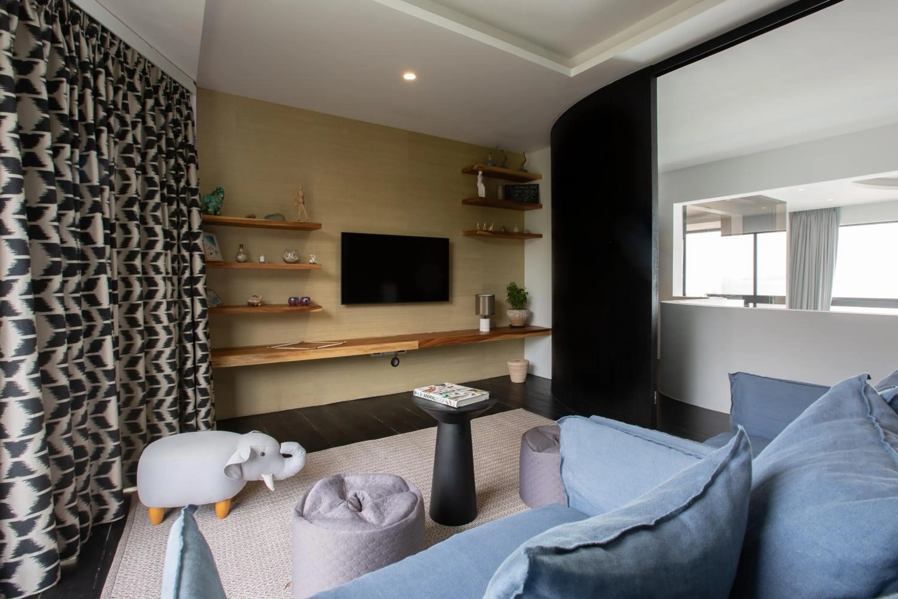 TV and multimedia in Villa U - 3BR Beachfront Haven