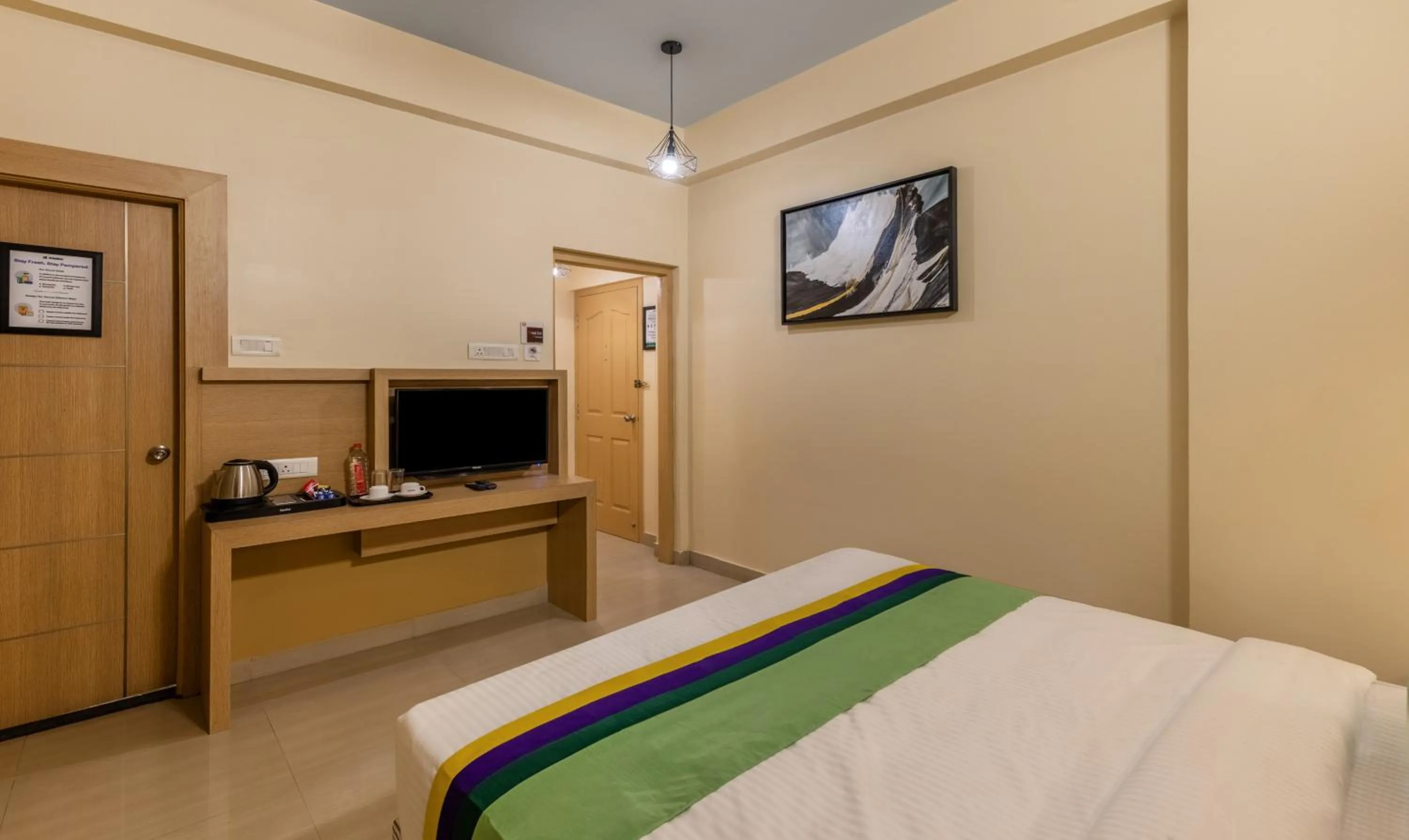 Bedroom, Bed in Treebo Premium Nestlay Rooms Nungambakkam