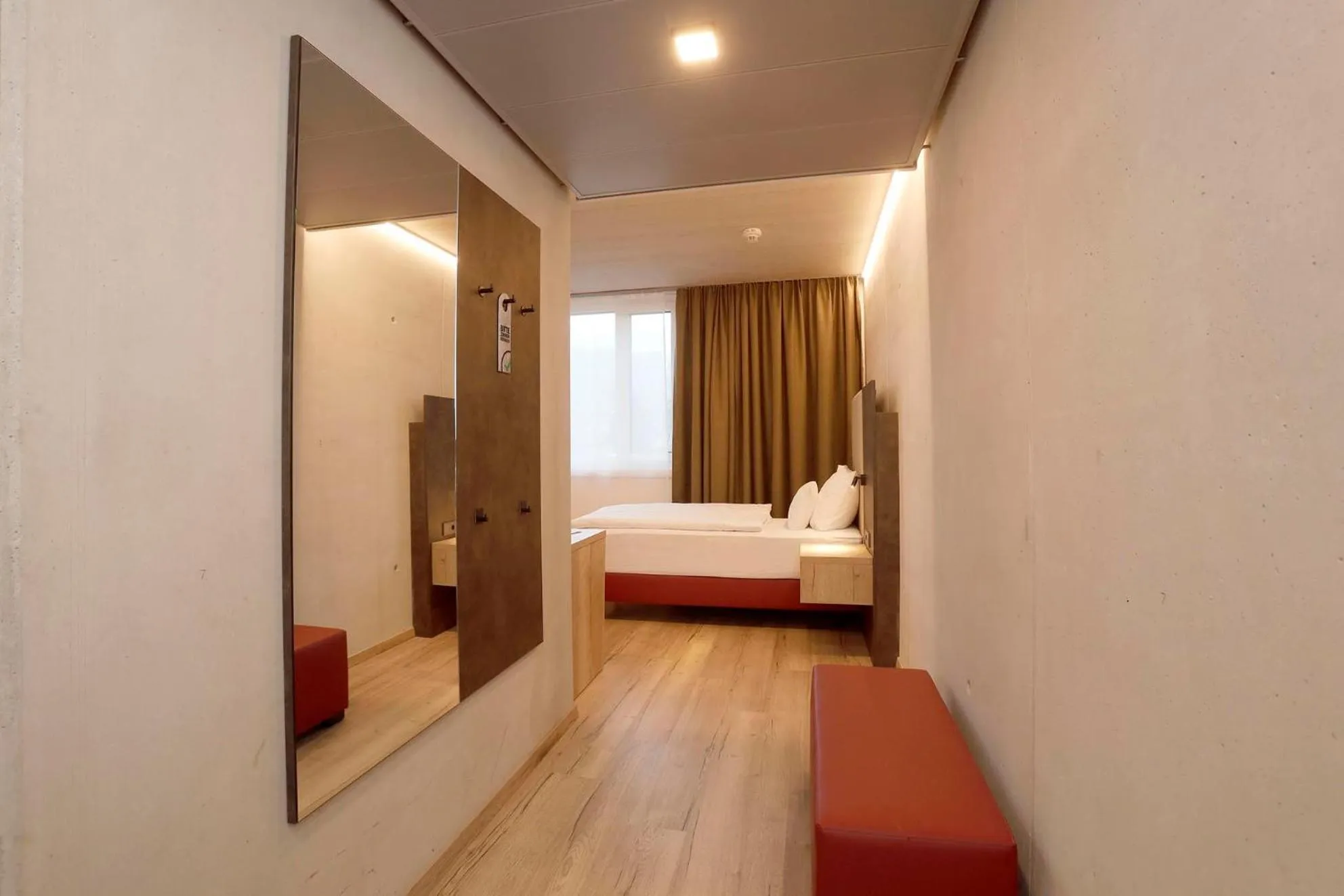 Bed in Hotel im Zentrum für Visionen