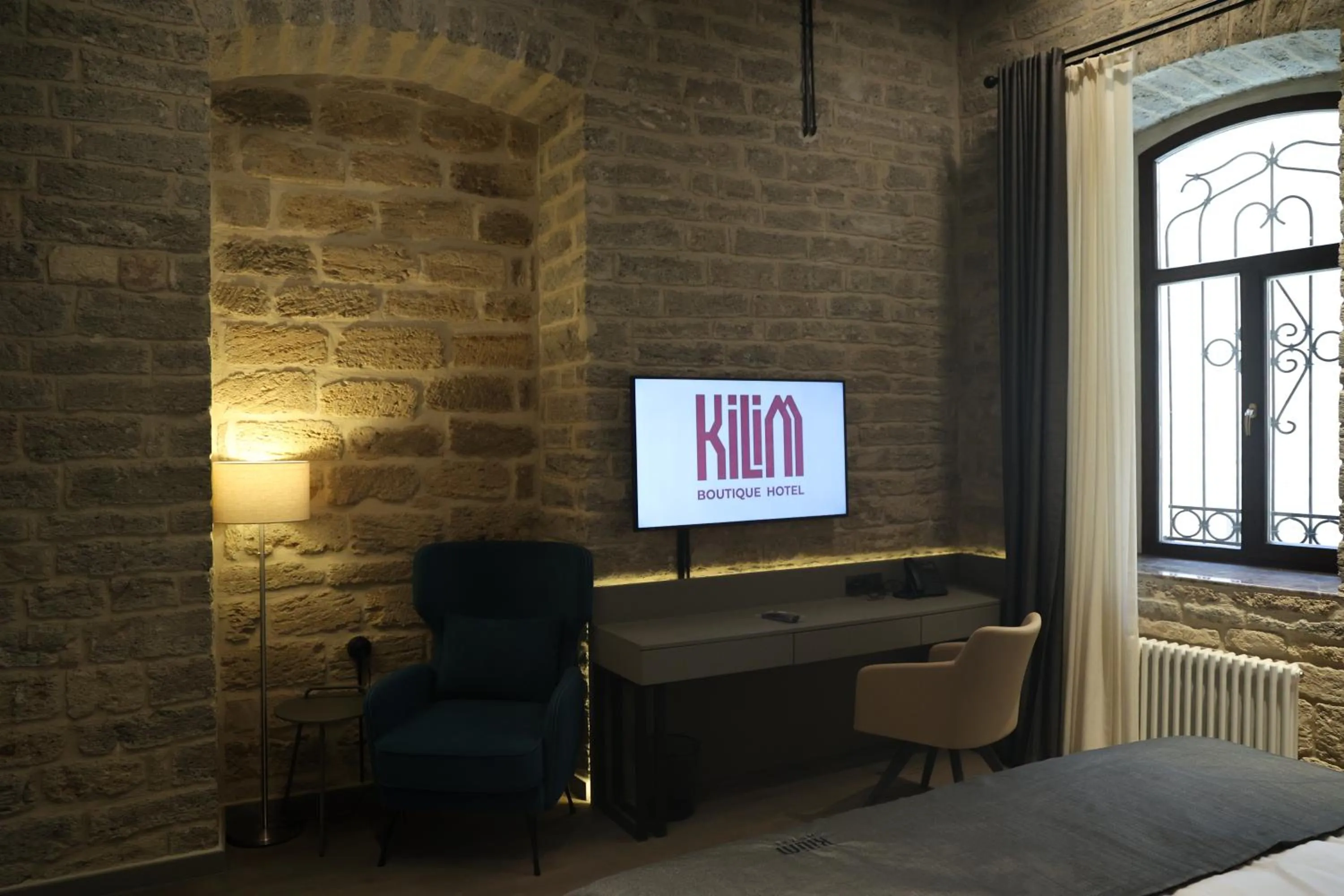 Bed in Kilim Boutique Hotel