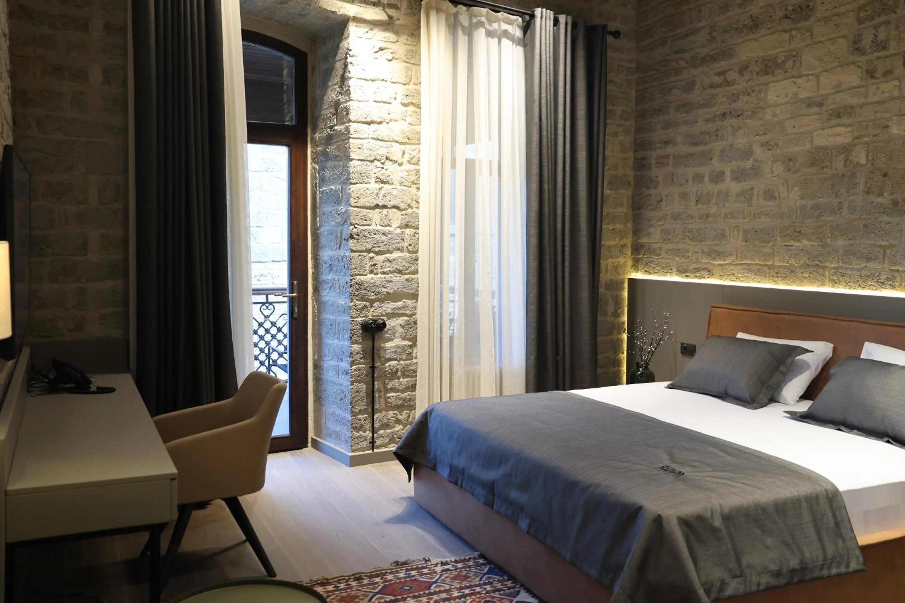 Bed in Kilim Boutique Hotel