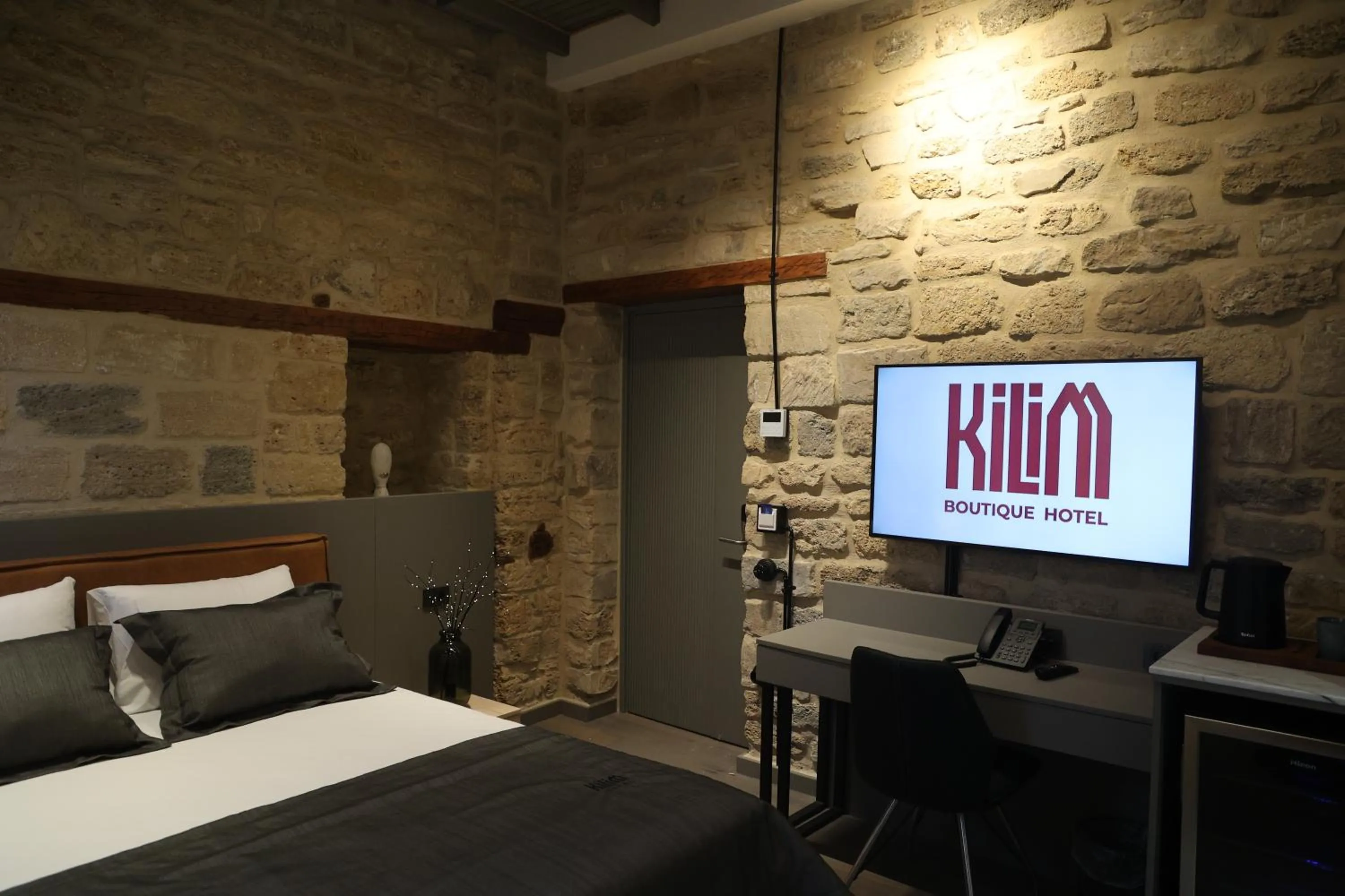 Bed in Kilim Boutique Hotel