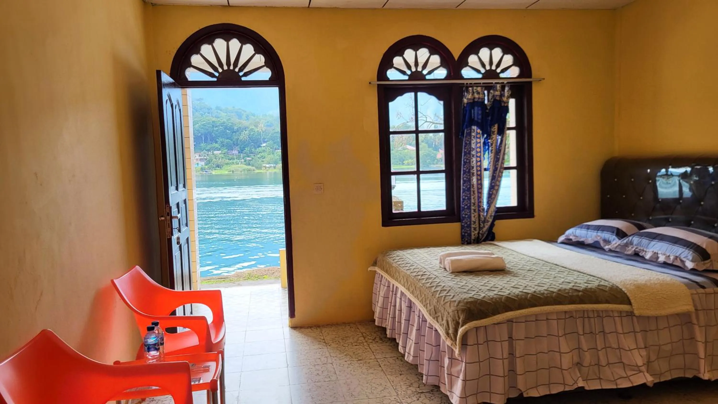 Bed in Abadi Guest House