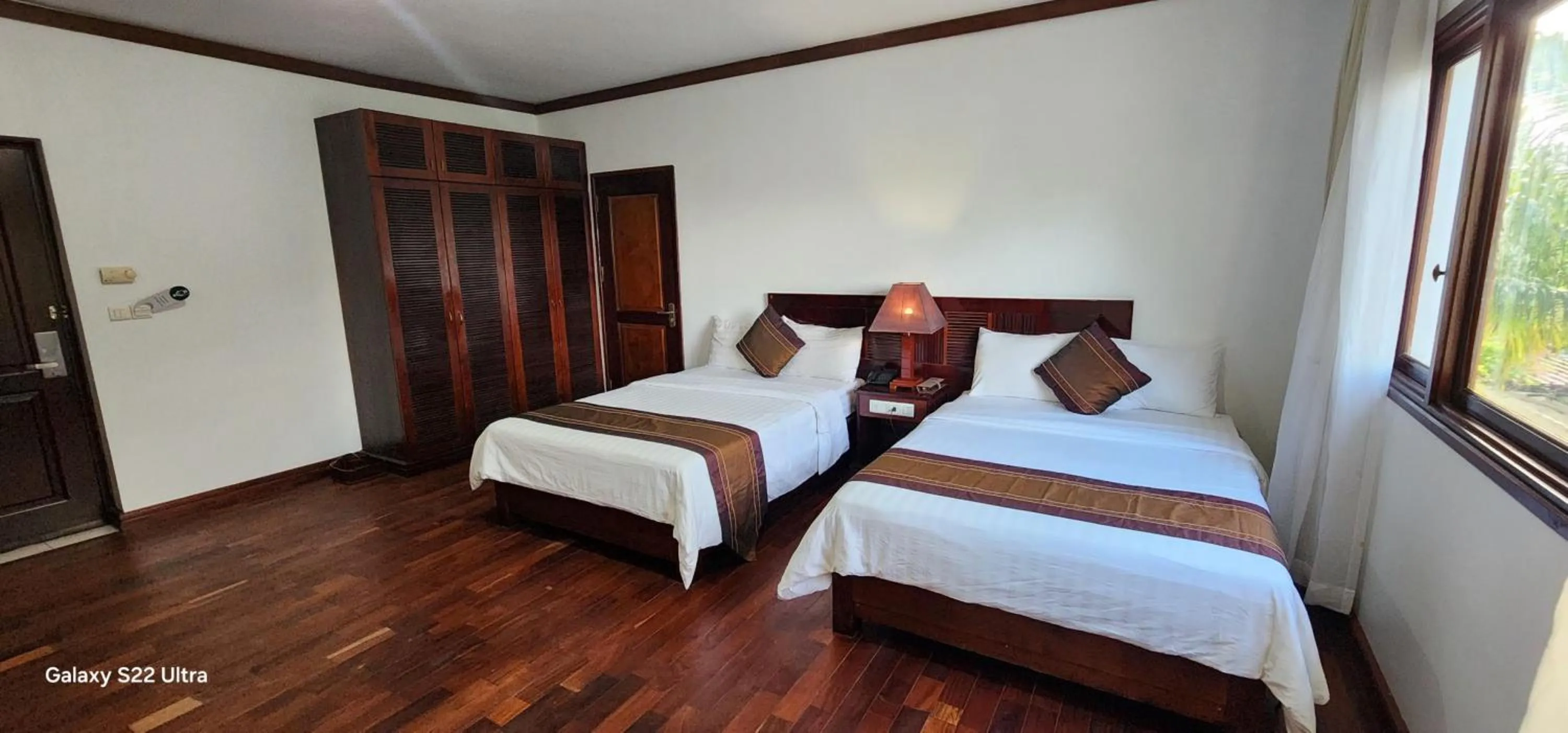 Photo of the whole room, Bed in EG Paradise Angkor Villa Hotel