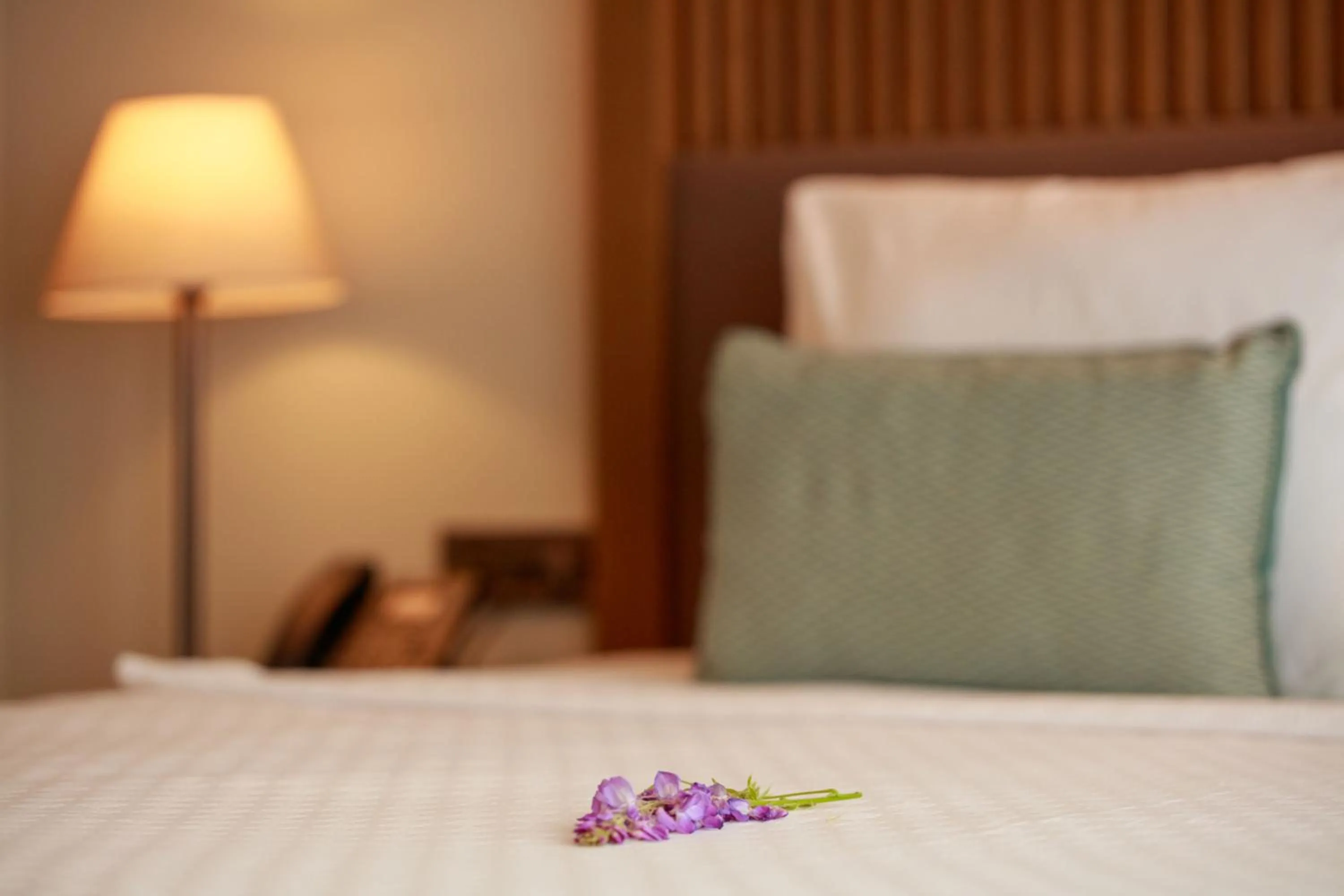 Bed in Casa Lumar Luxury Lodging- Adult Only