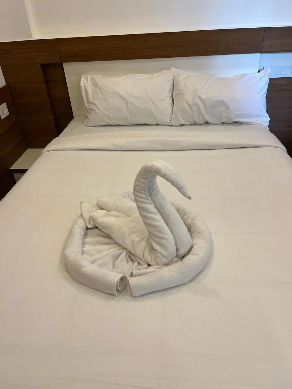 Bed in Welcome Hotels