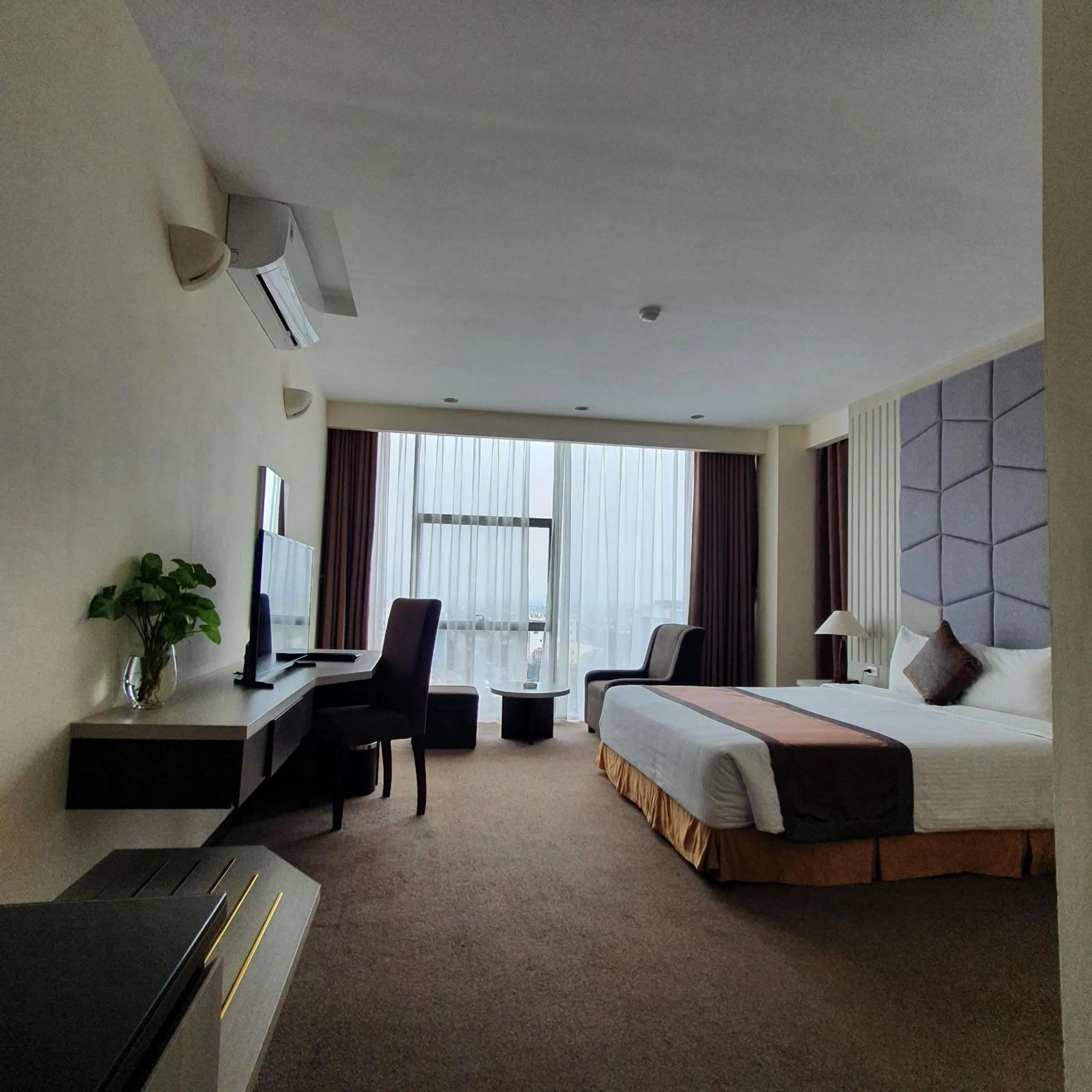 Bed in Muong Thanh Dien Chau Hotel