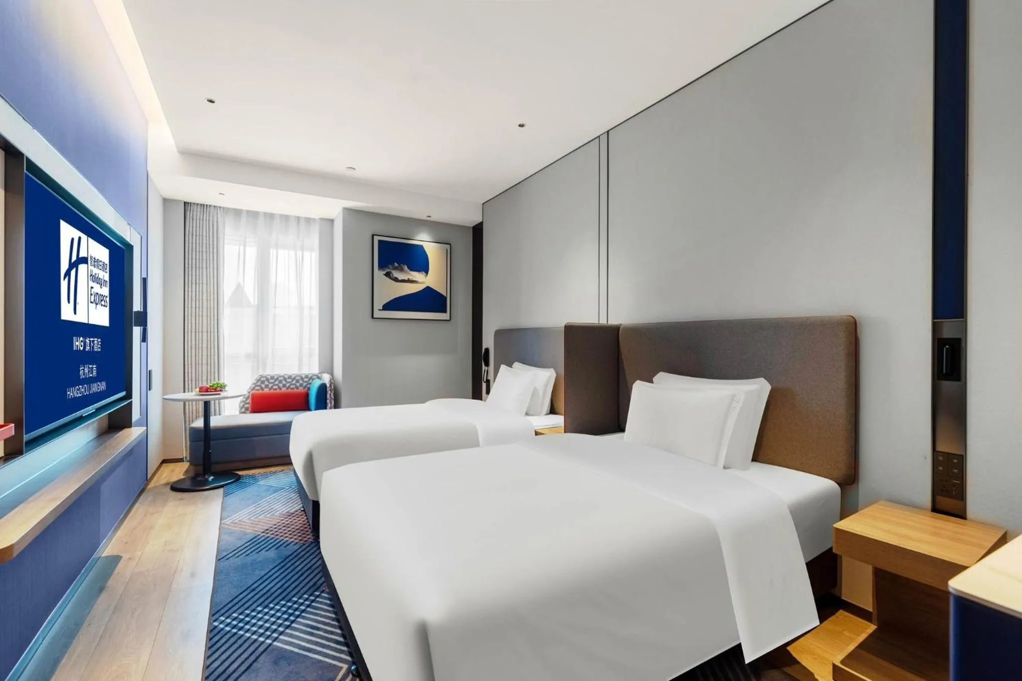 Photo of the whole room, Bed in Holiday Inn Express Hangzhou Jiangnan by IHG