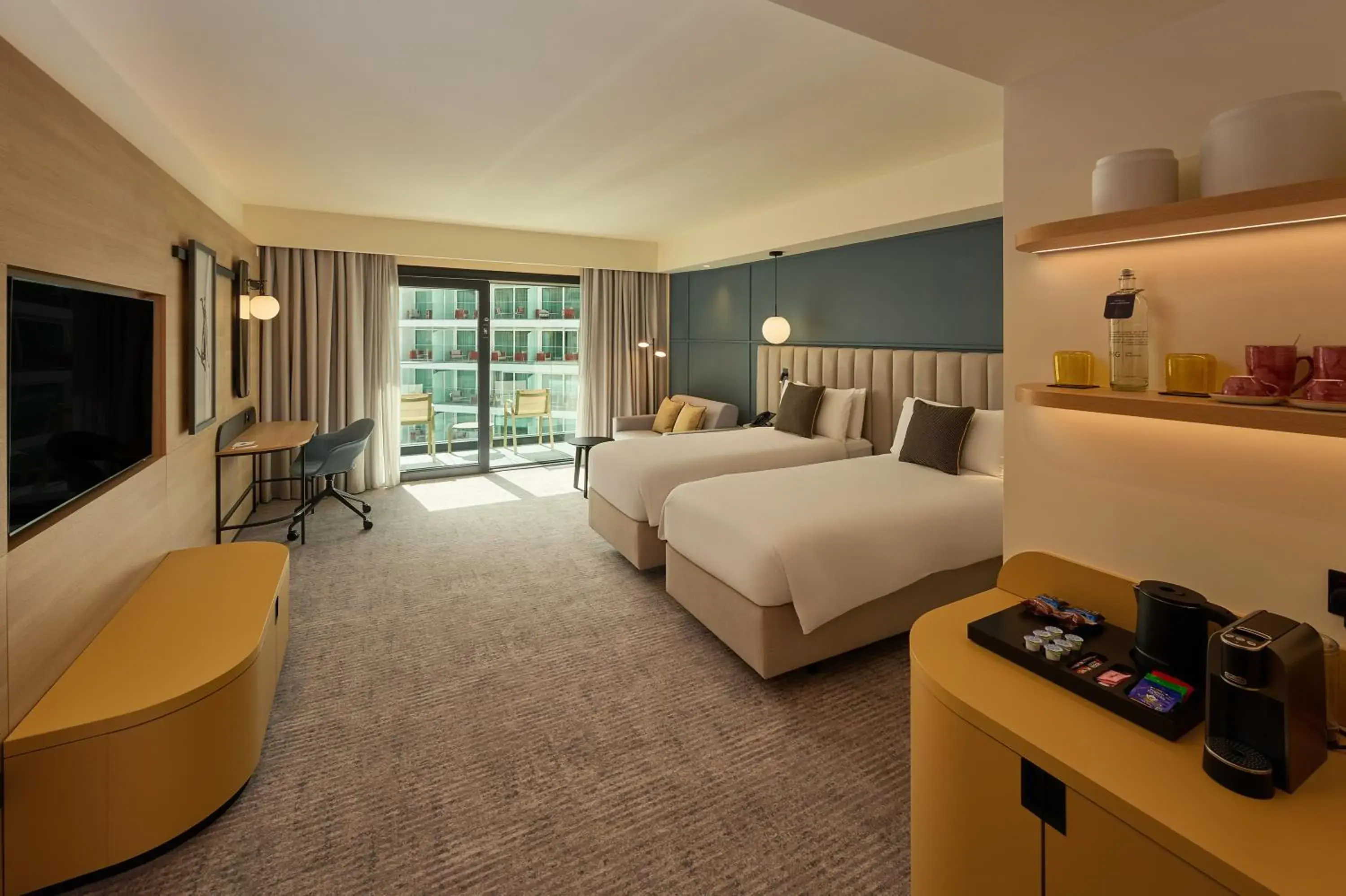 Premium Twin Room with Balcony and Sofa Bed in voco Malta by IHG Premium Twin Room with Balcony and Sofa Bed in voco Malta by IHG