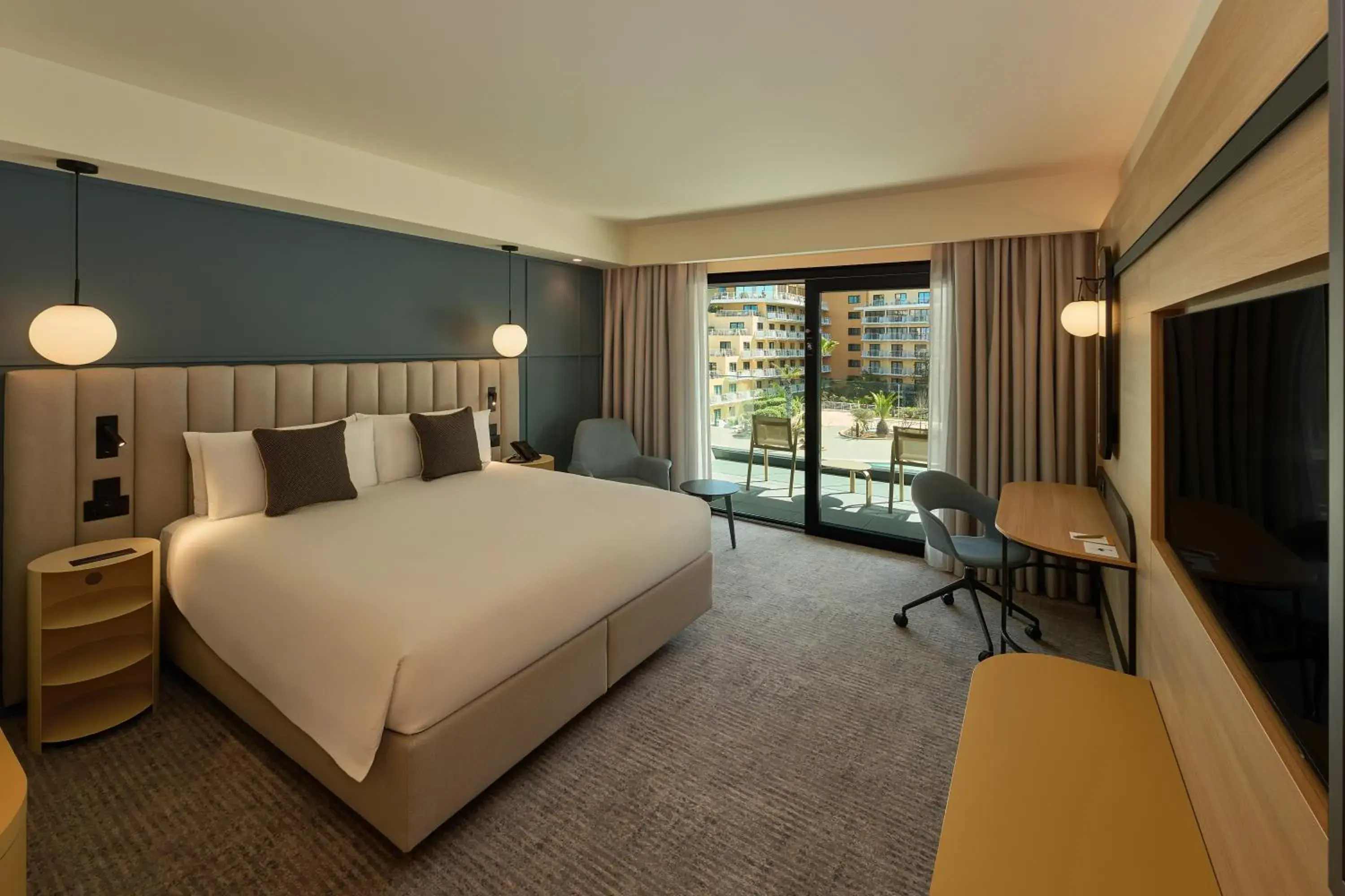 Standard King Room with Balcony in voco Malta by IHG Standard King Room with Balcony in voco Malta by IHG