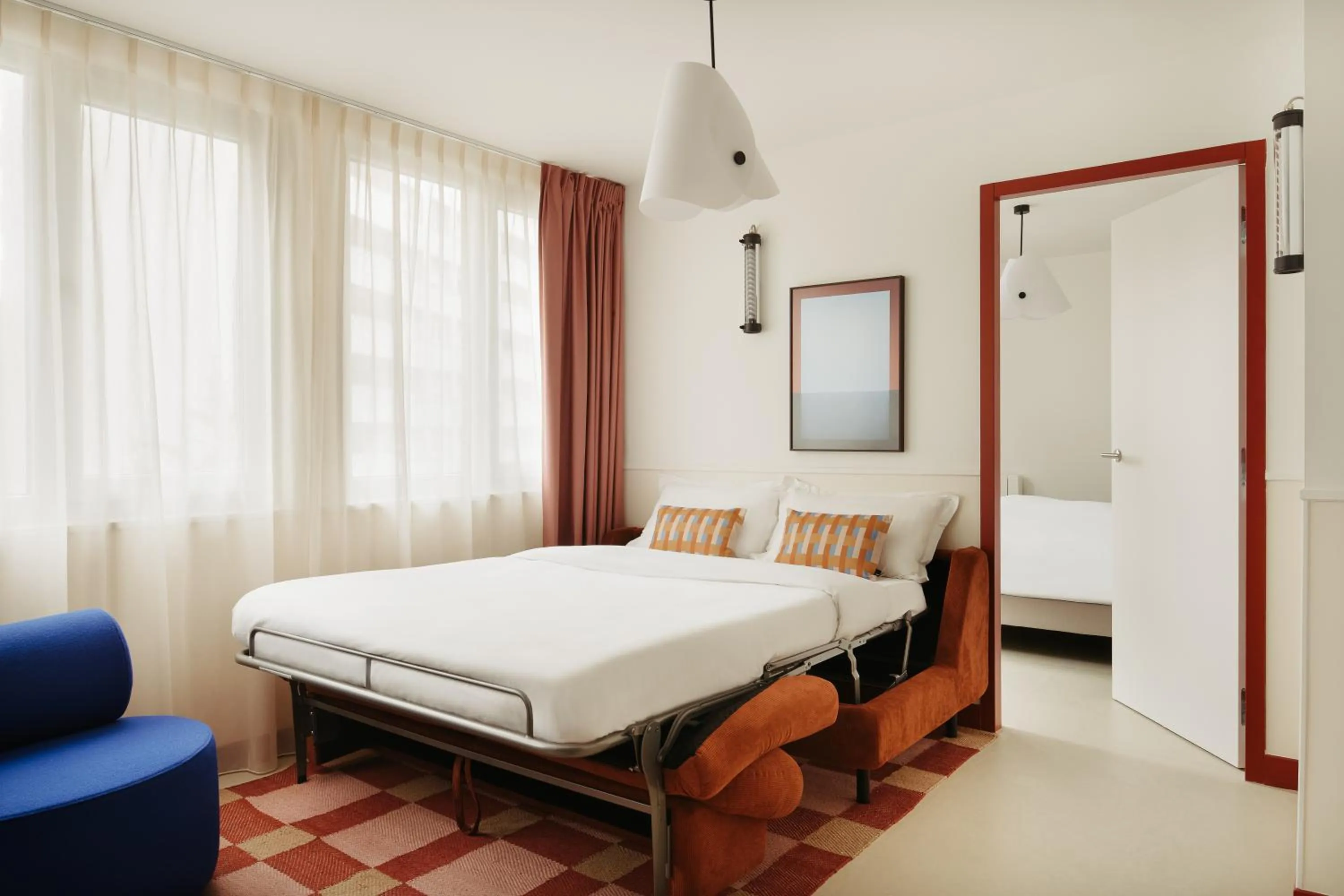 Living room, Bed in Edgar Suites Montrouge