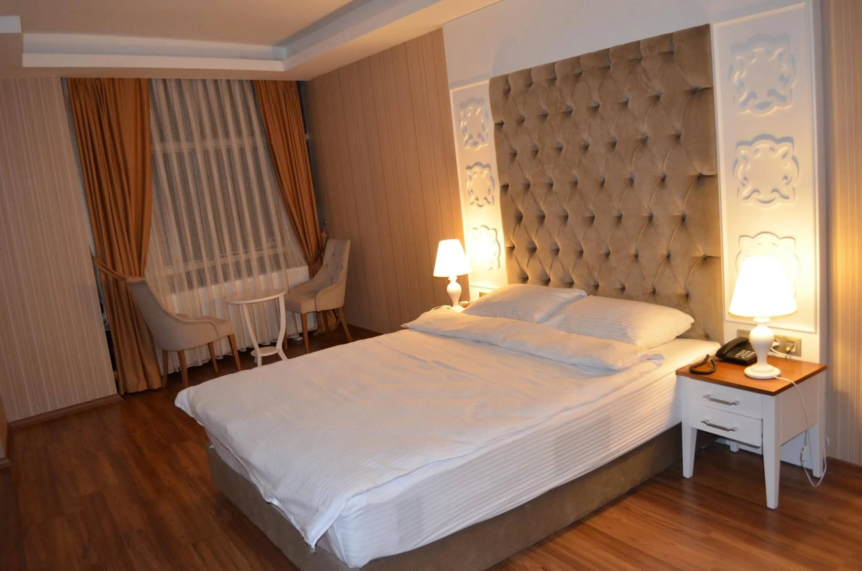Bedroom, Bed in Snowflake Dag Hotel & SPA