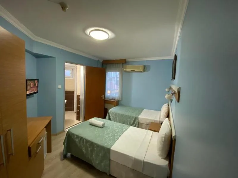 Bed in Hotel Oz Villa